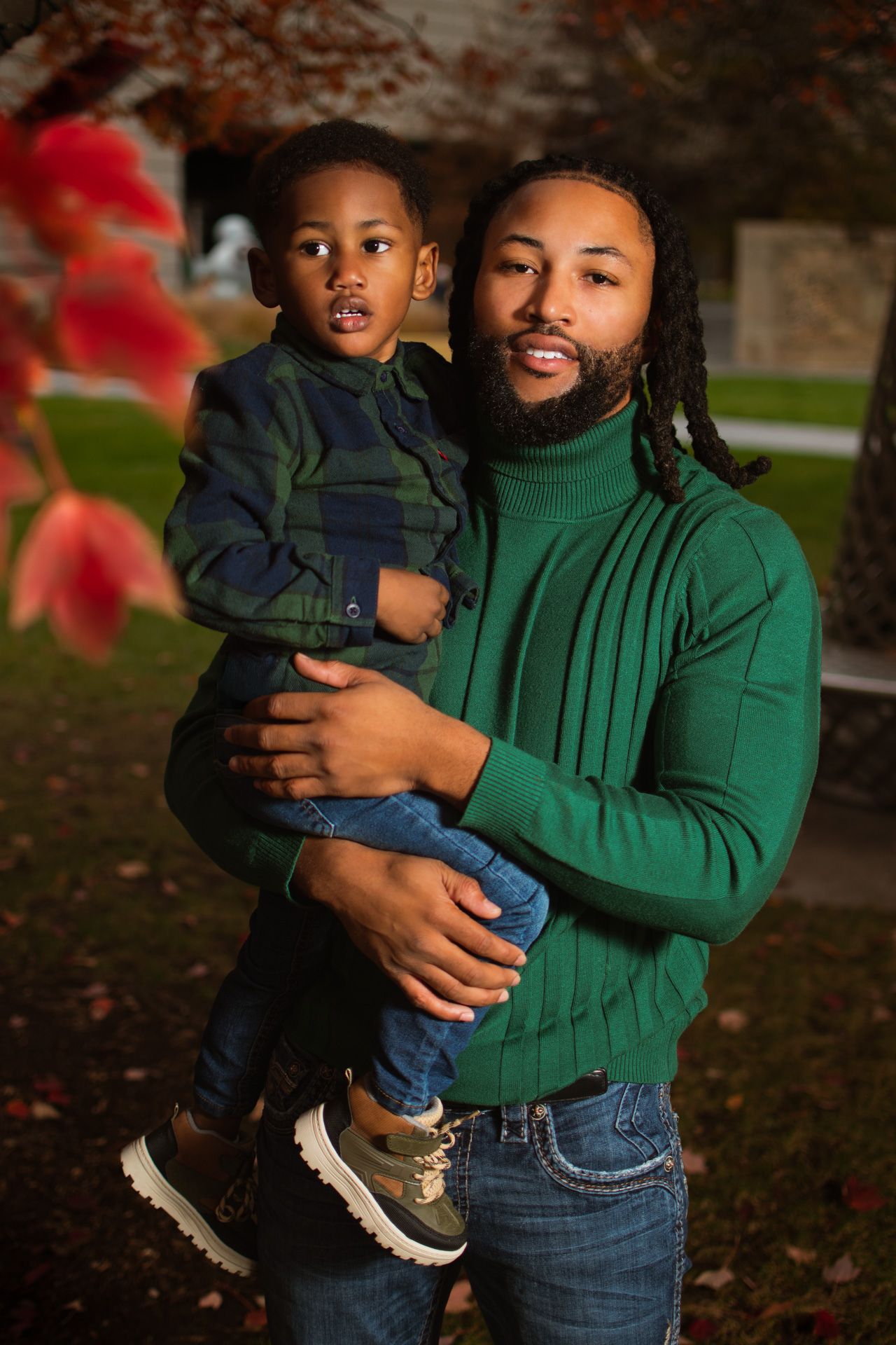 family portrait of black father and black son