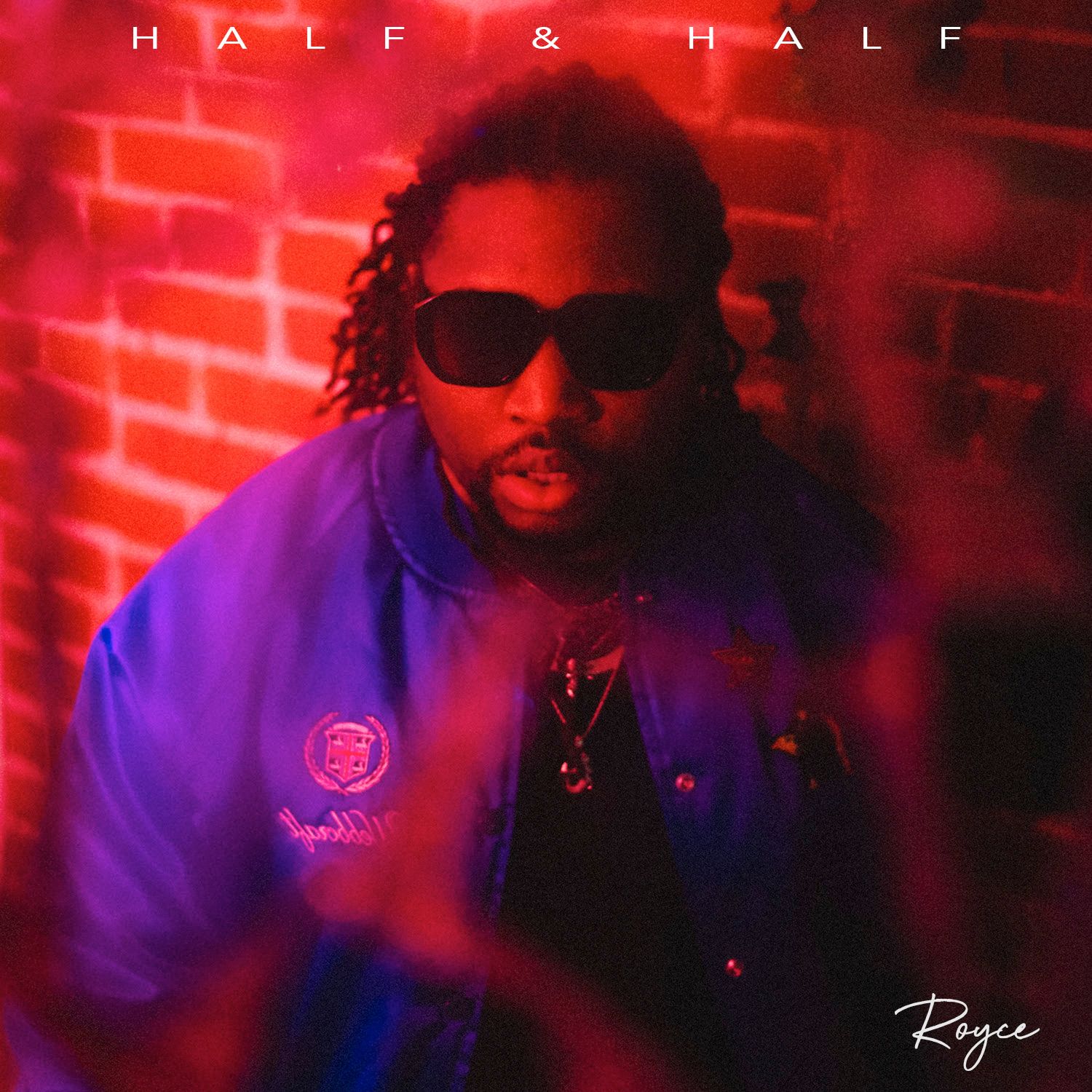 Album cover with red and purple lighting effects and 'HALF & HALF' text.