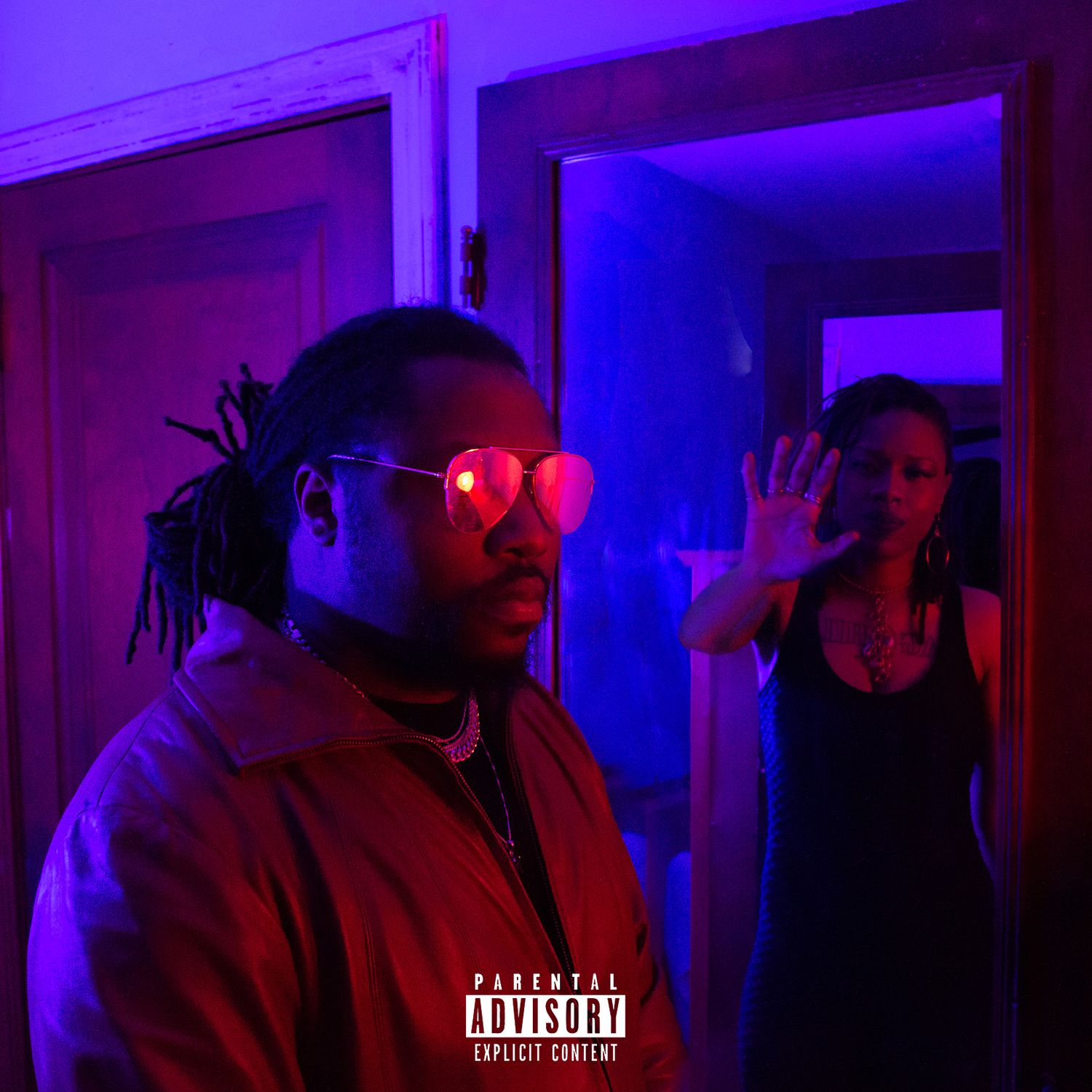 Album artwork featuring purple and blue neon lighting effects in a dark corridor.