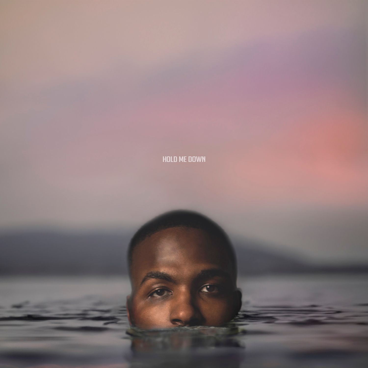 Artistic portrait series showing partial face emerging from water during sunset.