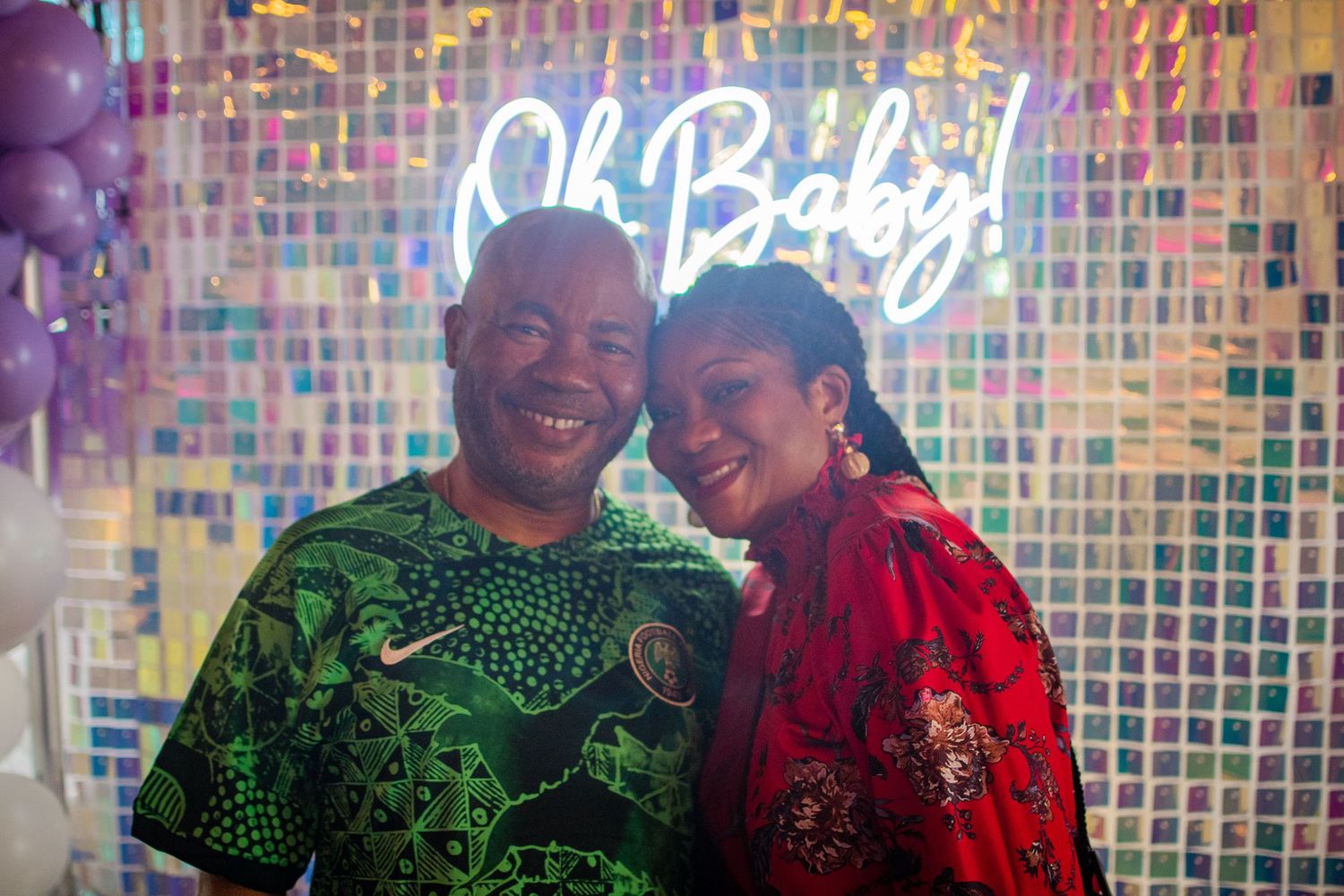Festive celebration with sparkly backdrop and colorful lighting effects.