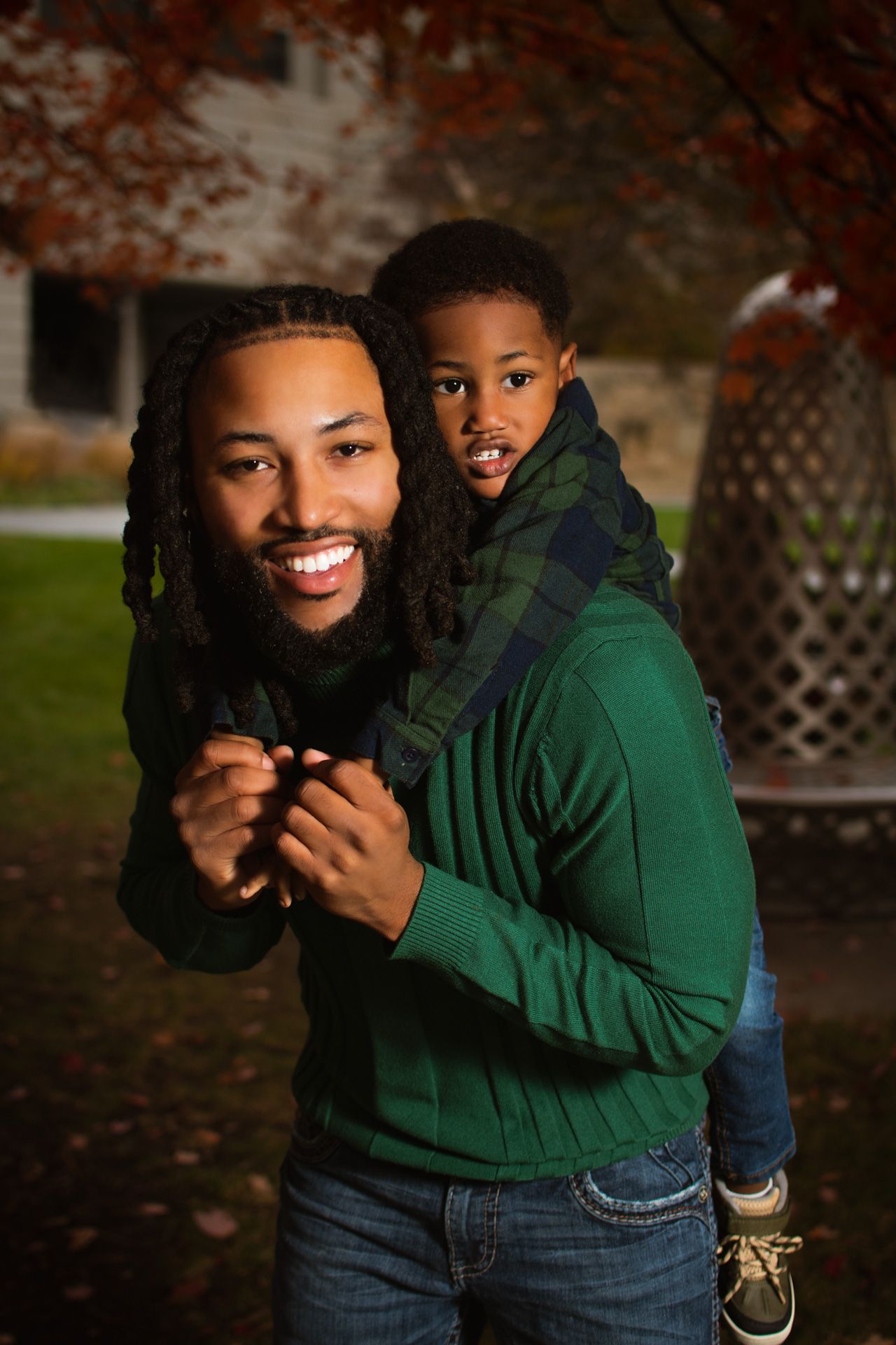 family portrait of black father and black son