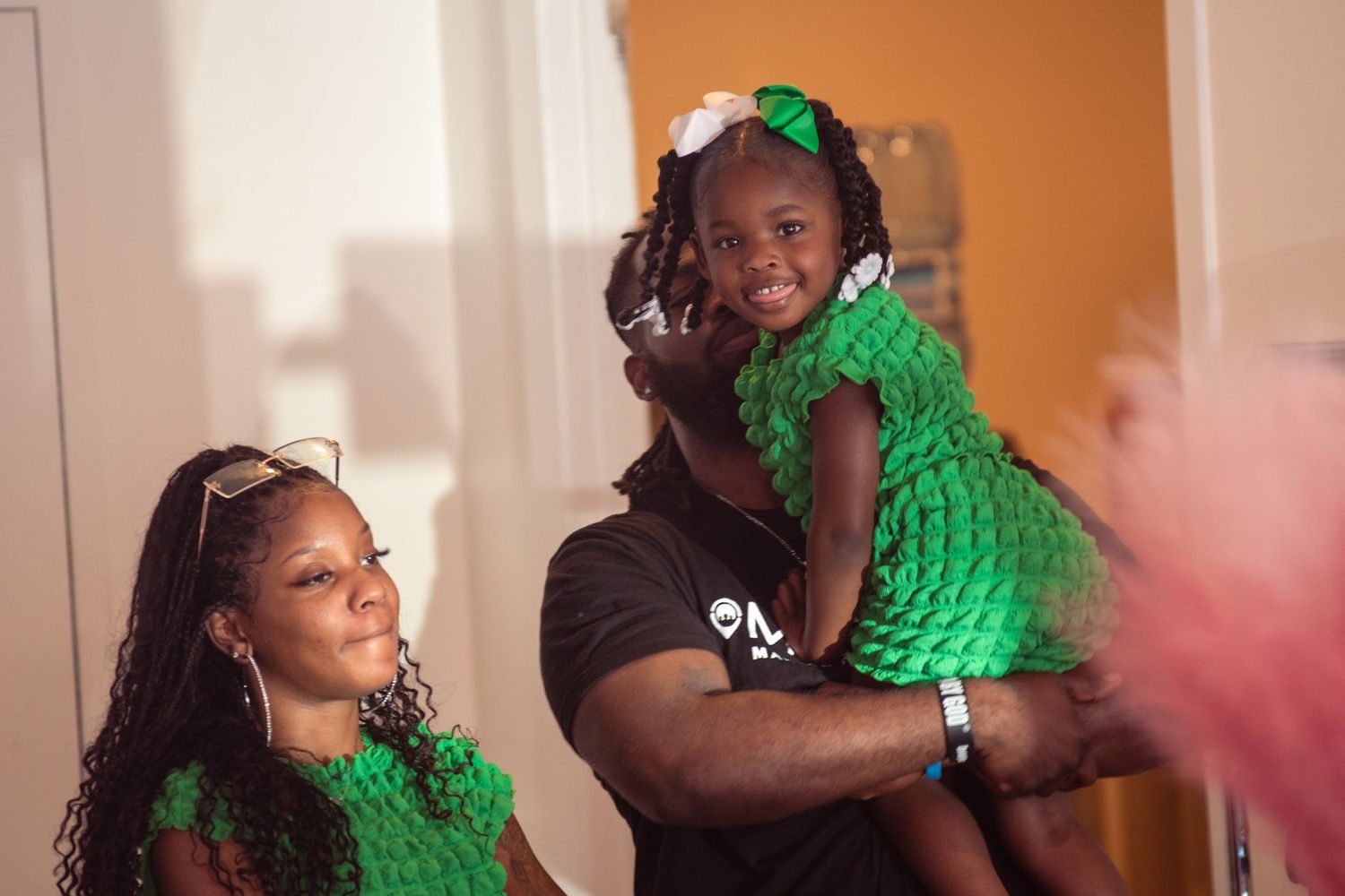 little black girl with mom and dad