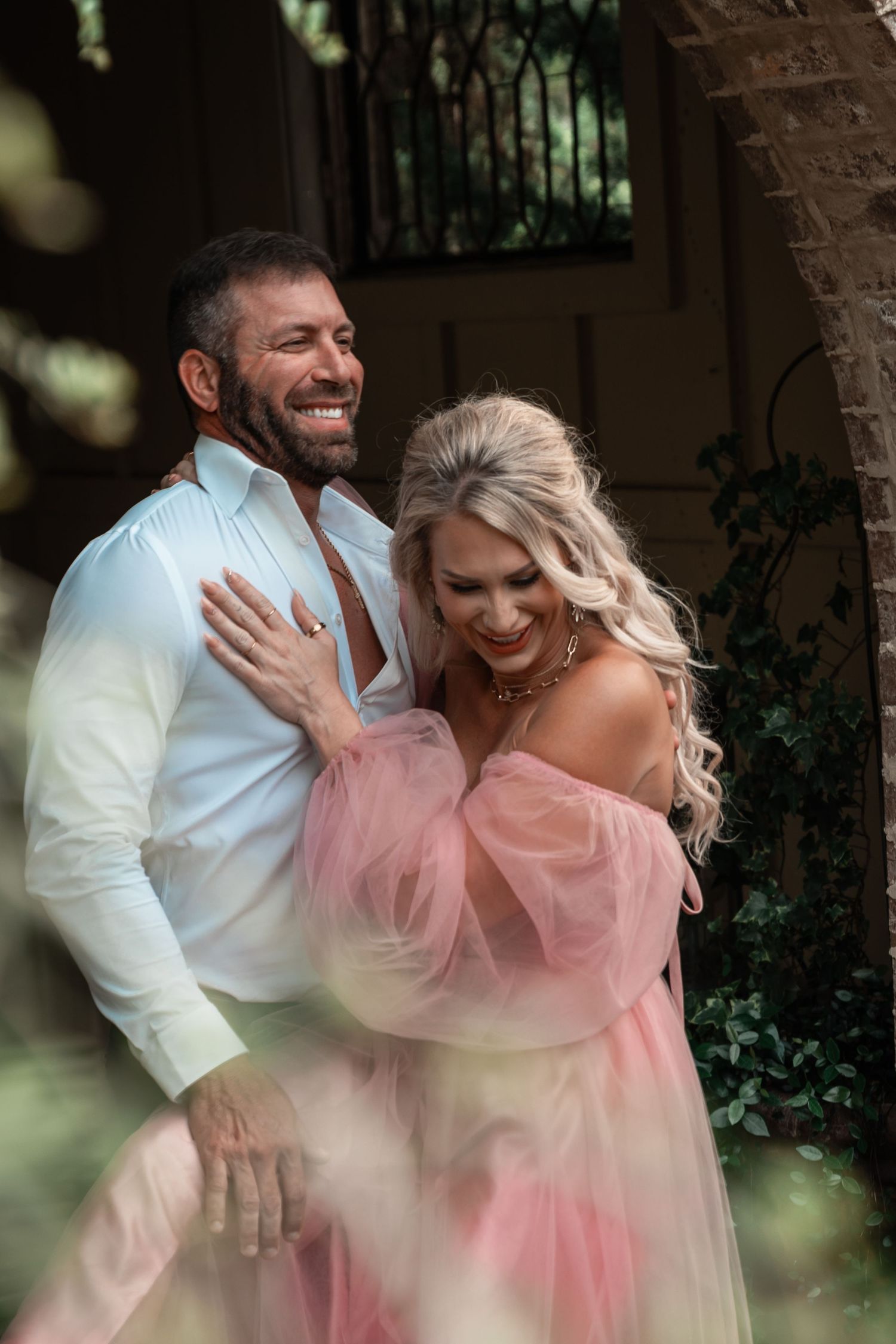 Romantic boat portrait with soft sunset tones and editorial-inspired styling