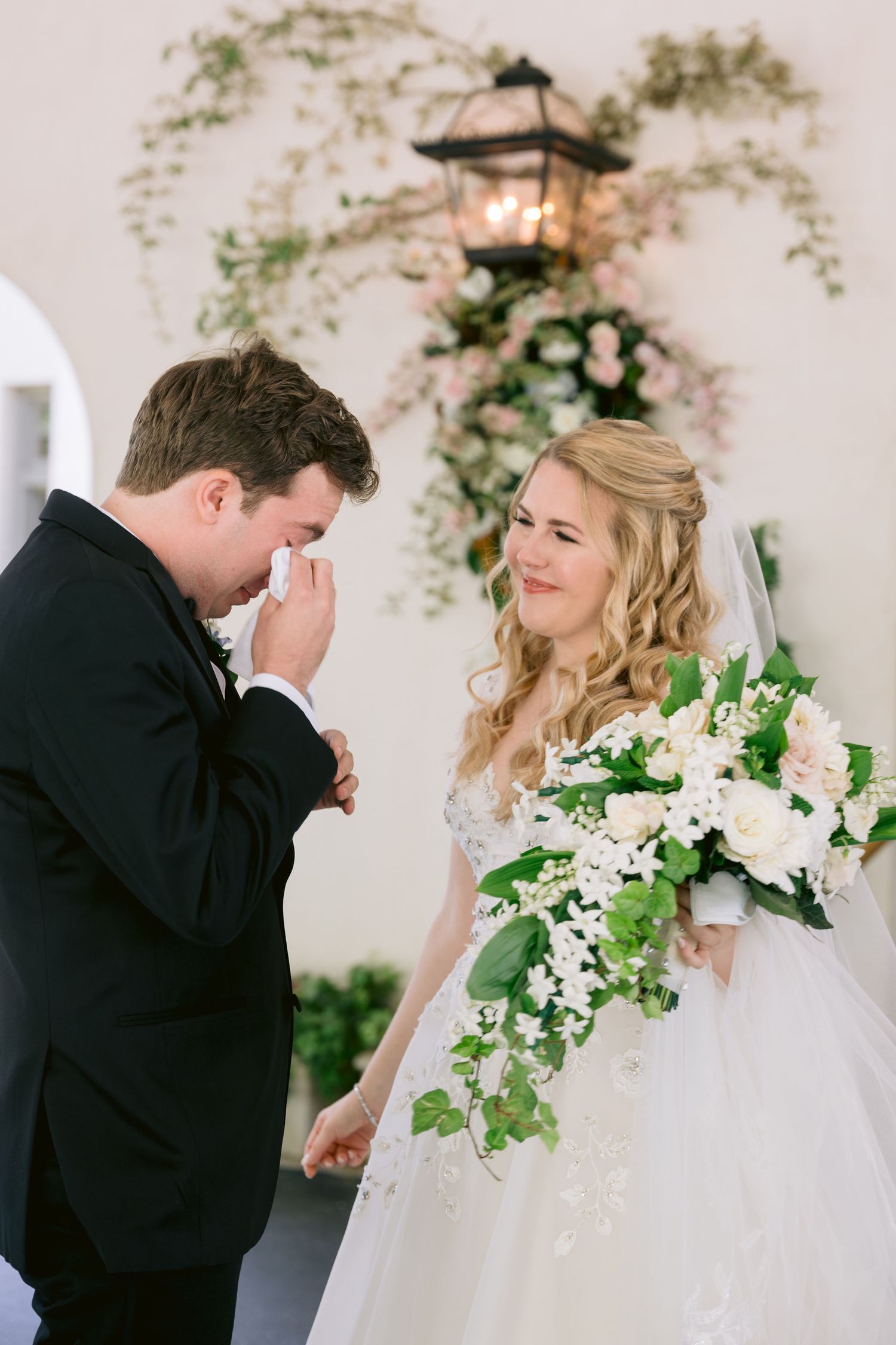 Tearful groom sees his bride for the first time before wedding ceremony at Callanwolde Fine Arts Center in Atlanta
