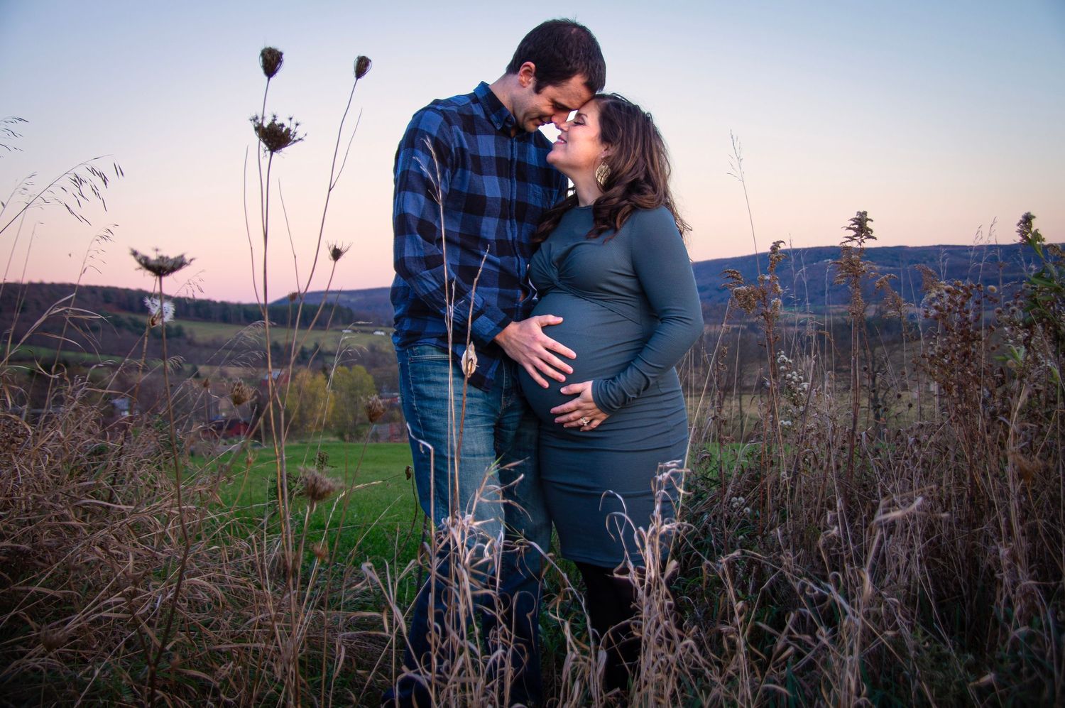 A man and woman maternity portrait photo for the website WhiteFlamingoPhotos.com