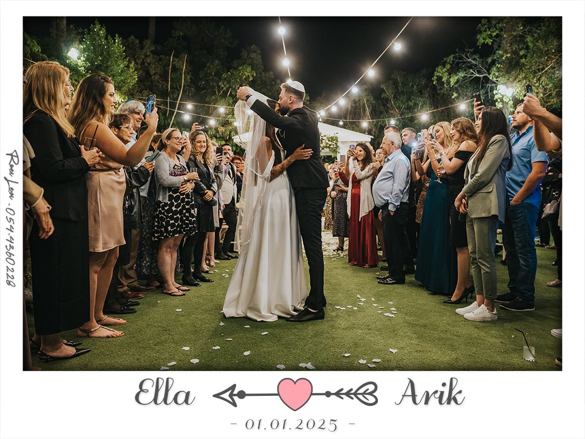 Wedding guests surround a celebrating couple under string lights at an outdoor reception.
