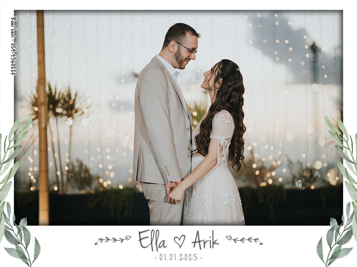 A romantic wedding portrait with twinkle lights and greenery decorations.