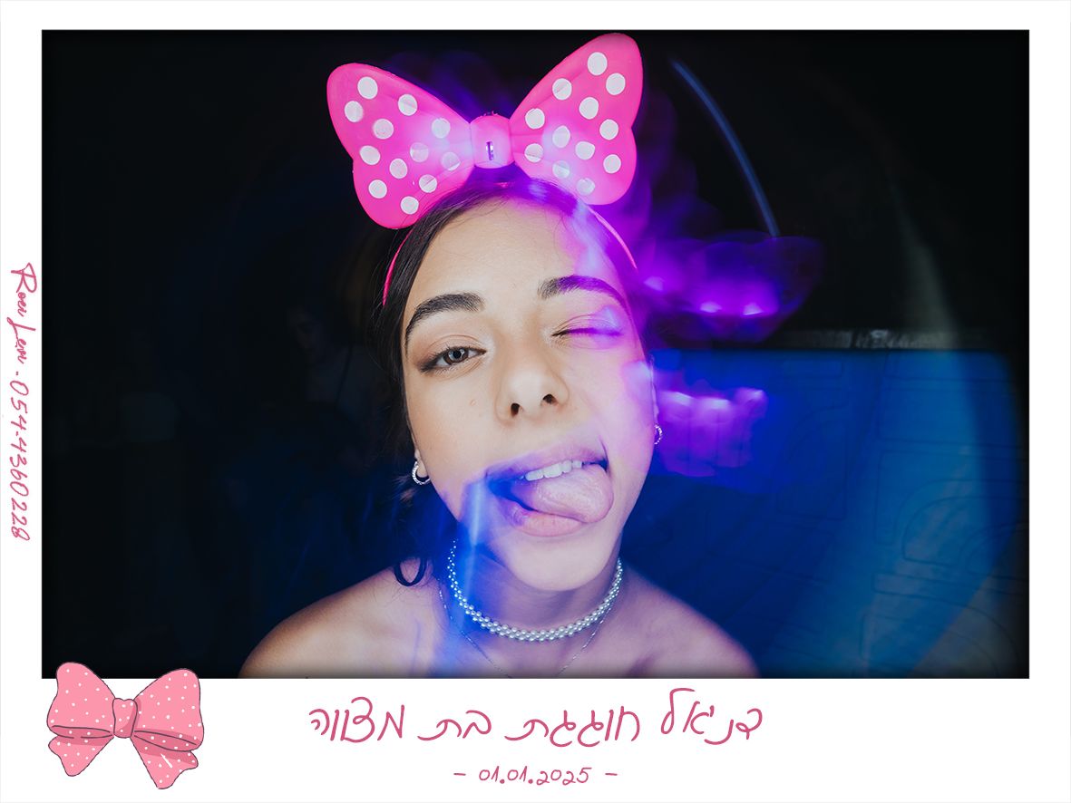 Close-up portrait with pink bow accessory and purple lighting effects.