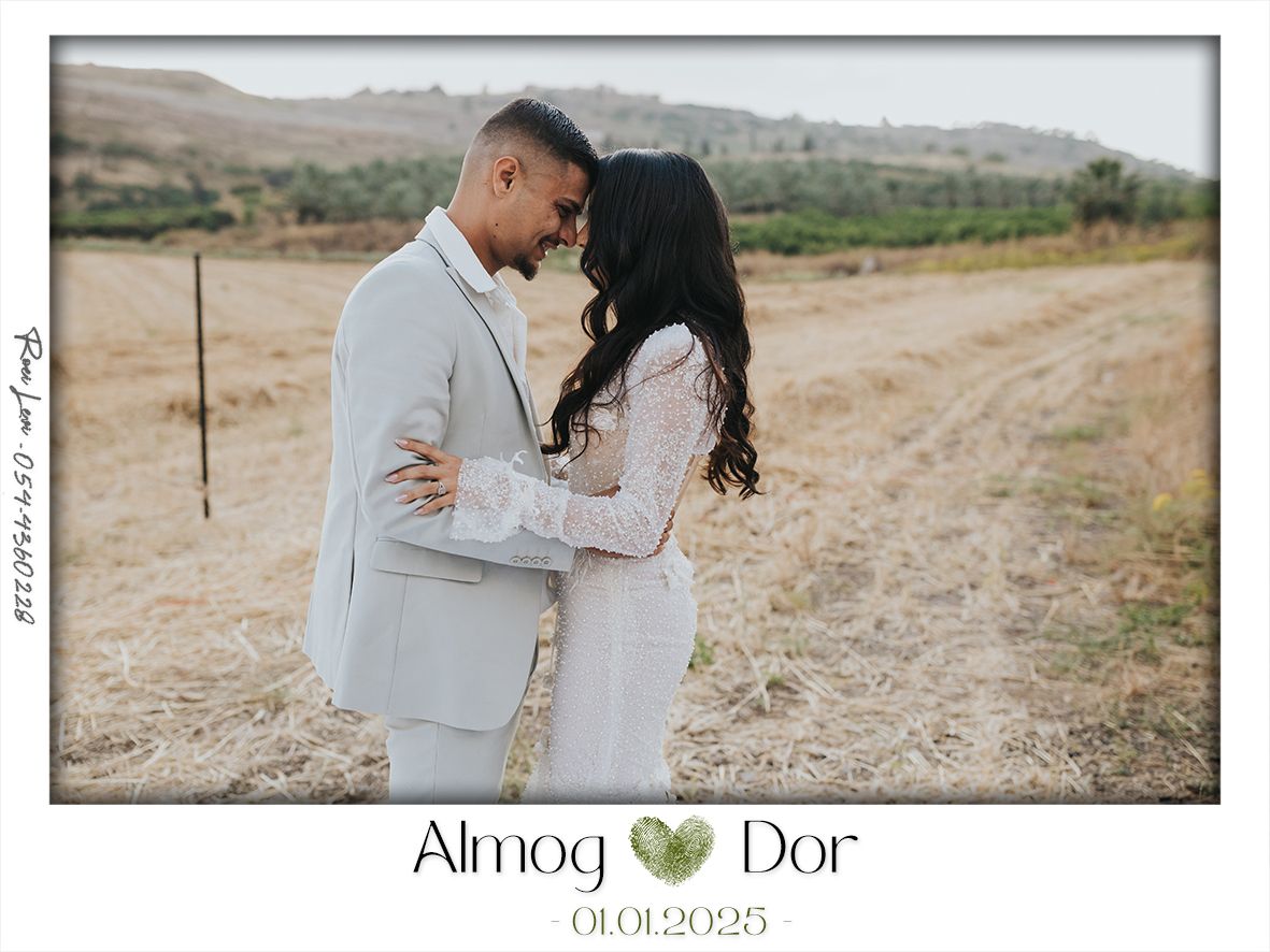 A couple shares a tender moment against a backdrop of rolling desert hills.