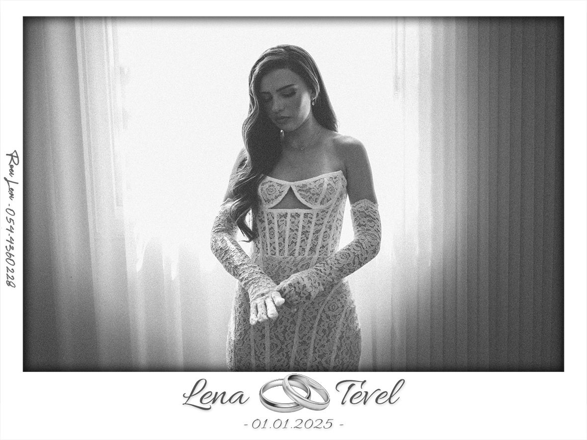 A black and white portrait of someone in a detailed corset dress by a window.