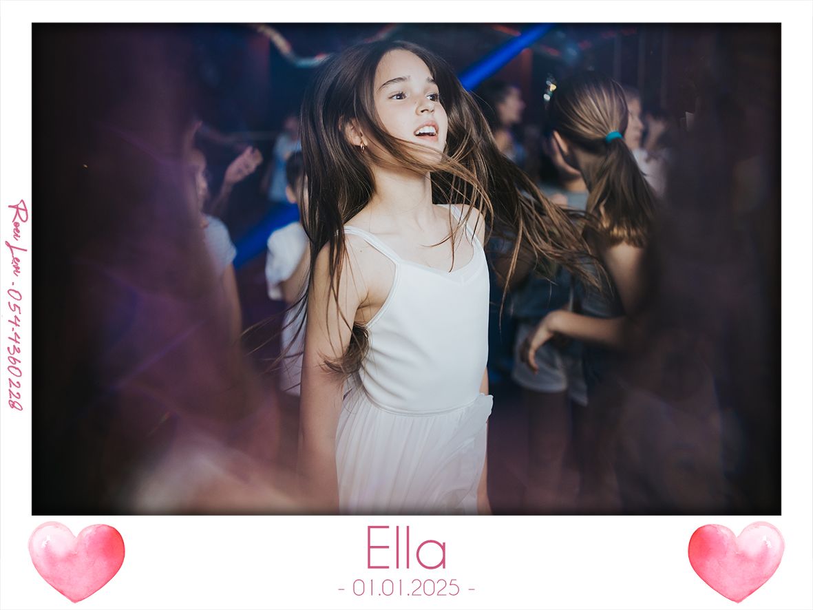 Young person in white dress dancing joyfully at a party with blurred lights and crowd in background.