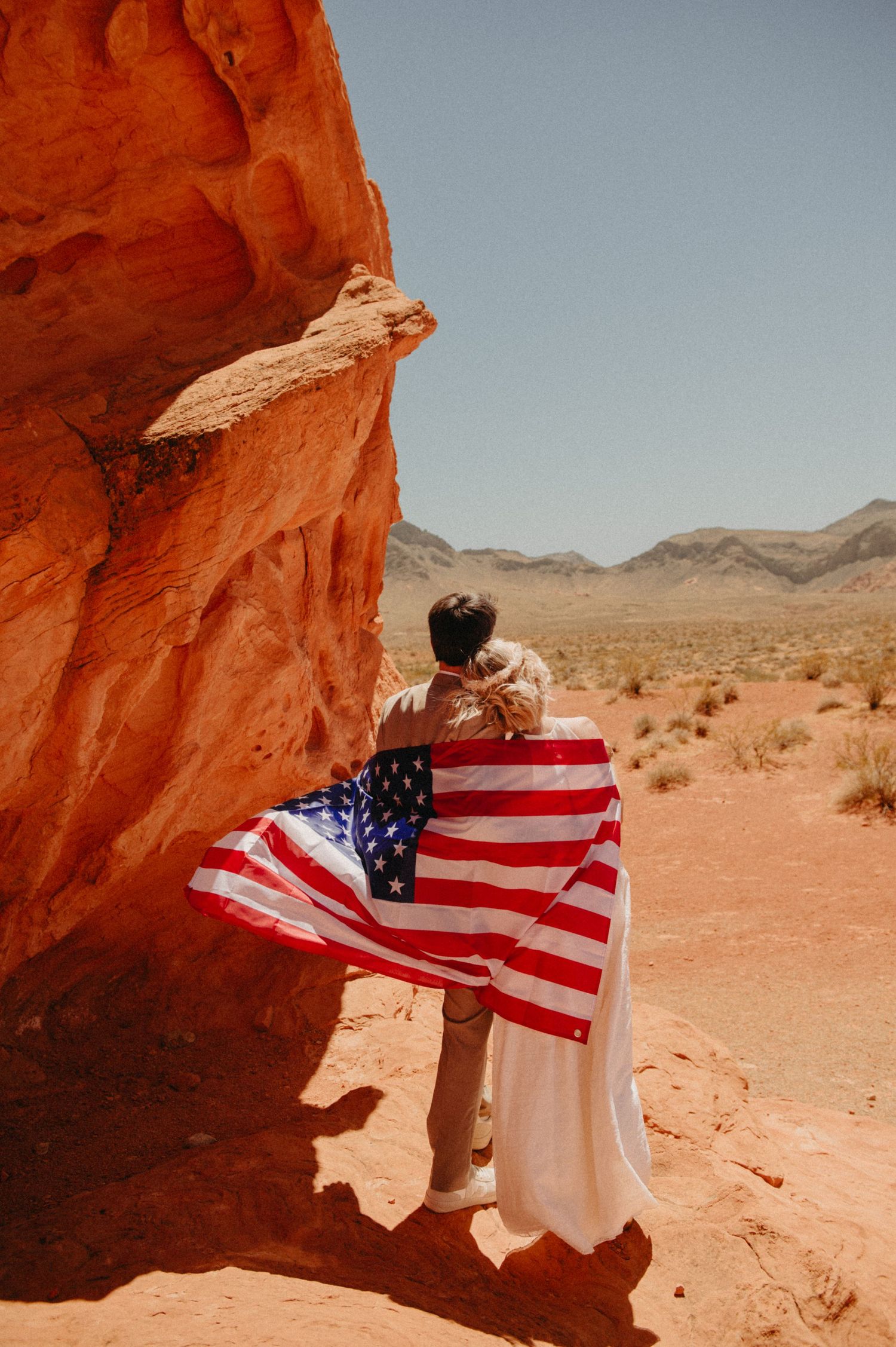 Bride and groom looking in the distance during destination wedding in Nevada, USA.
