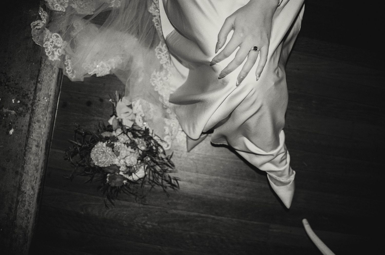 Abstract black and white photography showing flowing white fabric with dramatic shadows and textures.