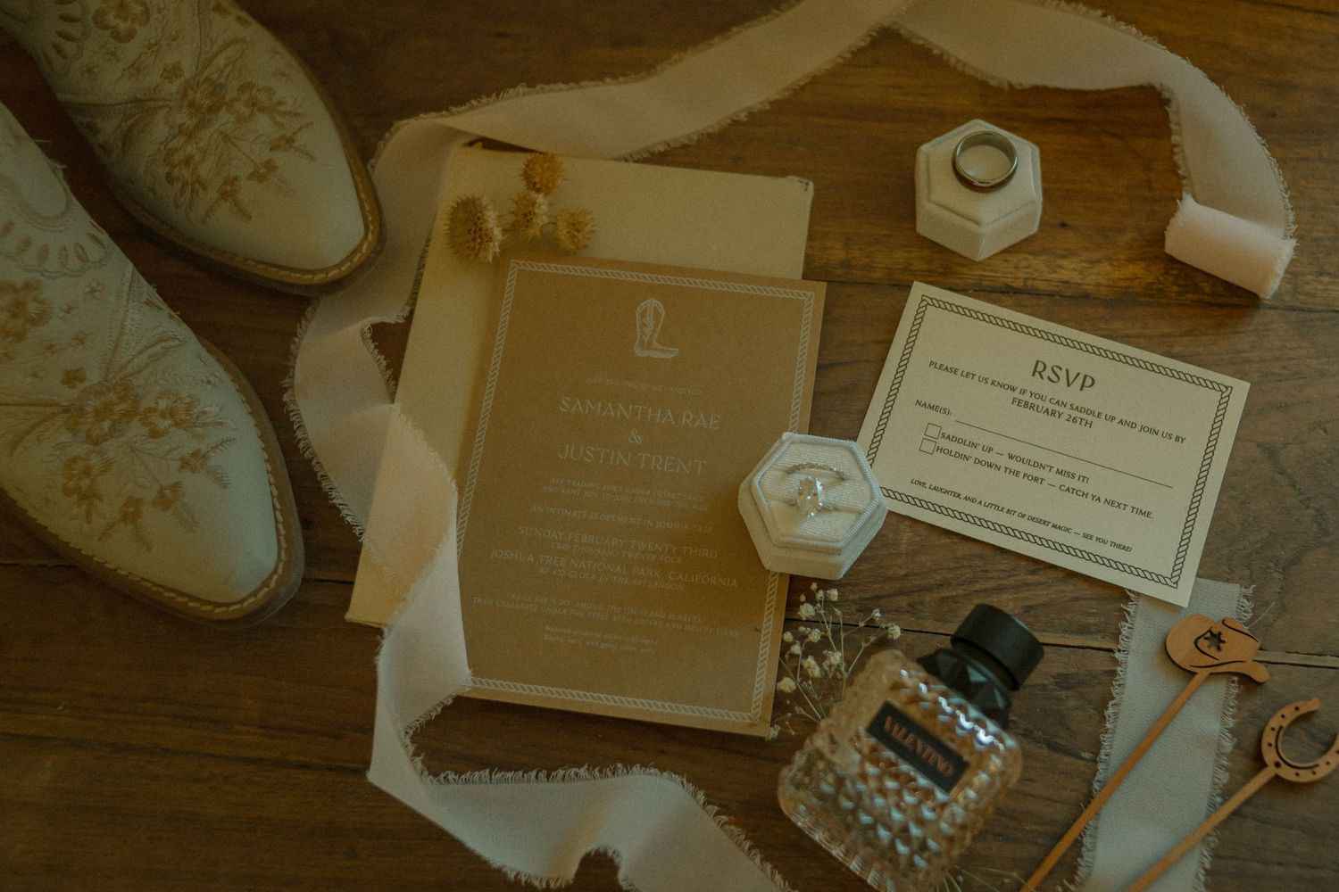 Flat lay photography of bridal shoes, wedding invitation, rsvp, bride's ring, and perfume in Southern California