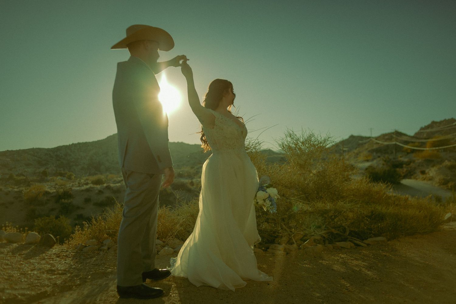 Joshua Tree Elopement photography of Bride and Groom celebrating after an intimate ceremony