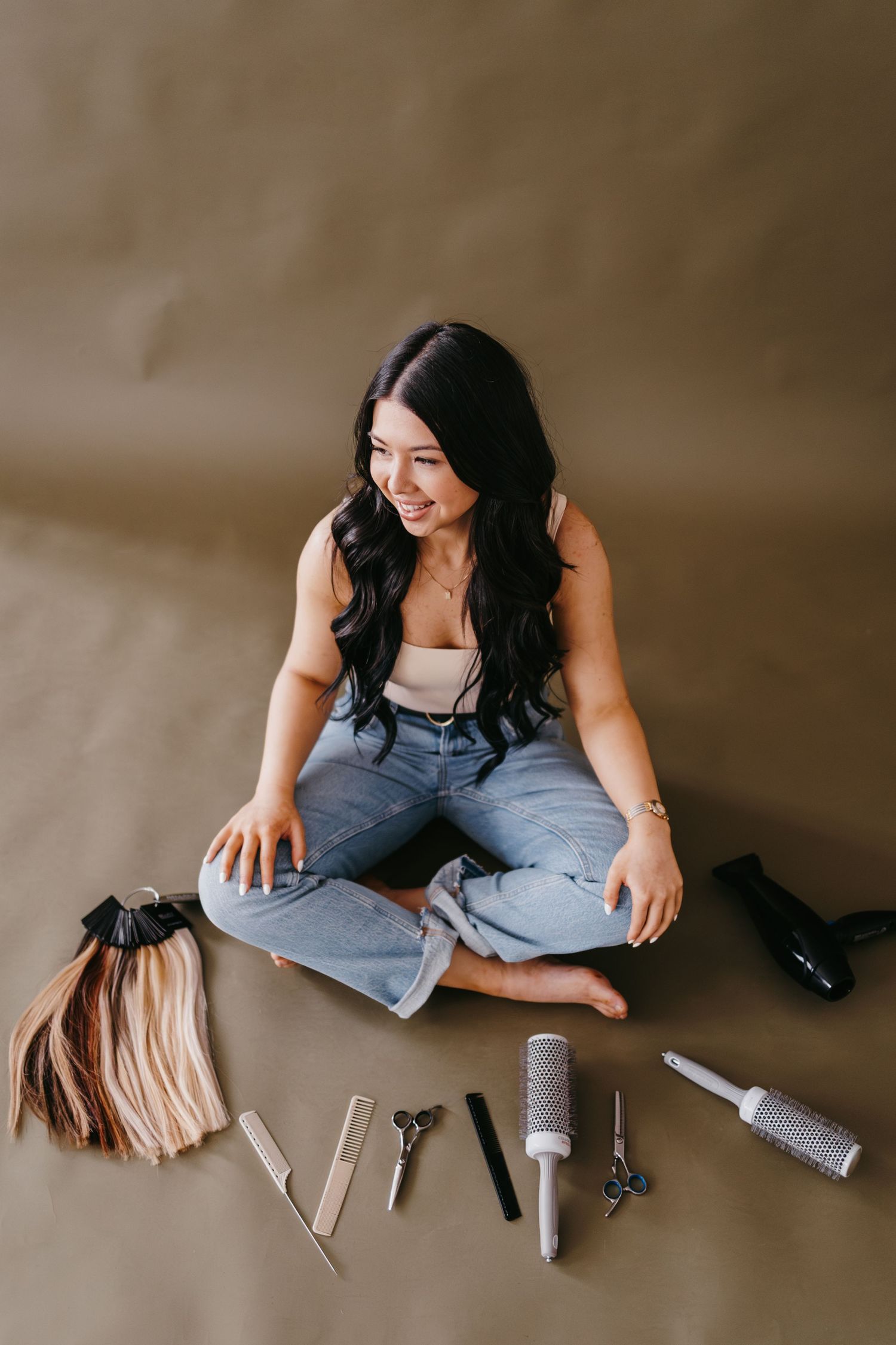 Lifestyle product photography setup with hair styling tools and accessories.