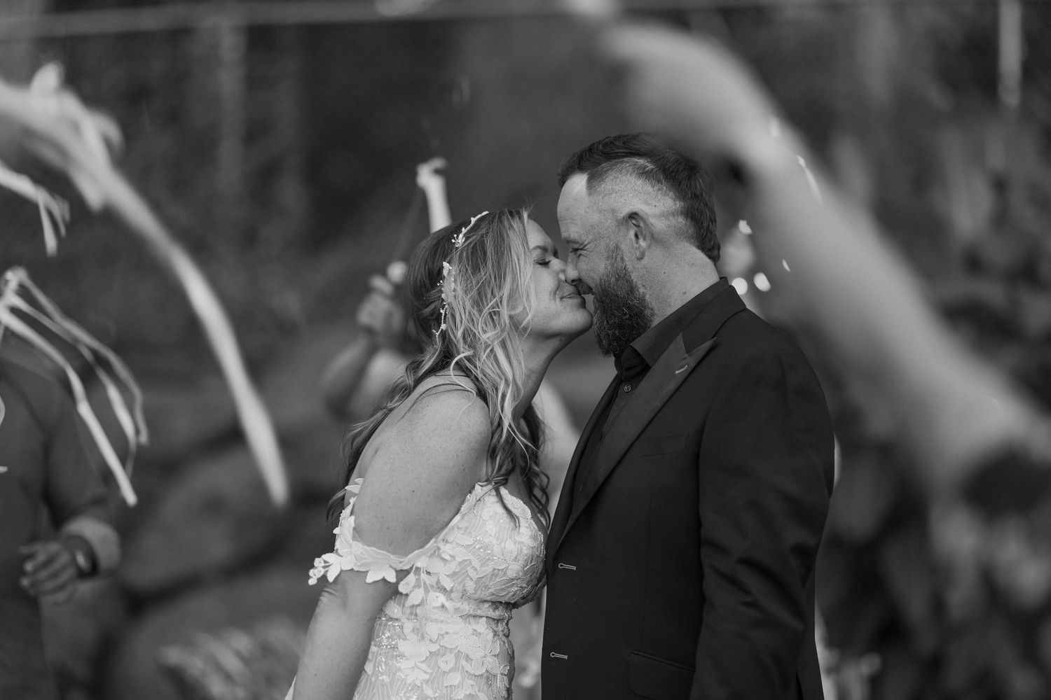 Emotional black and white wedding ceremony moments with natural reactions.