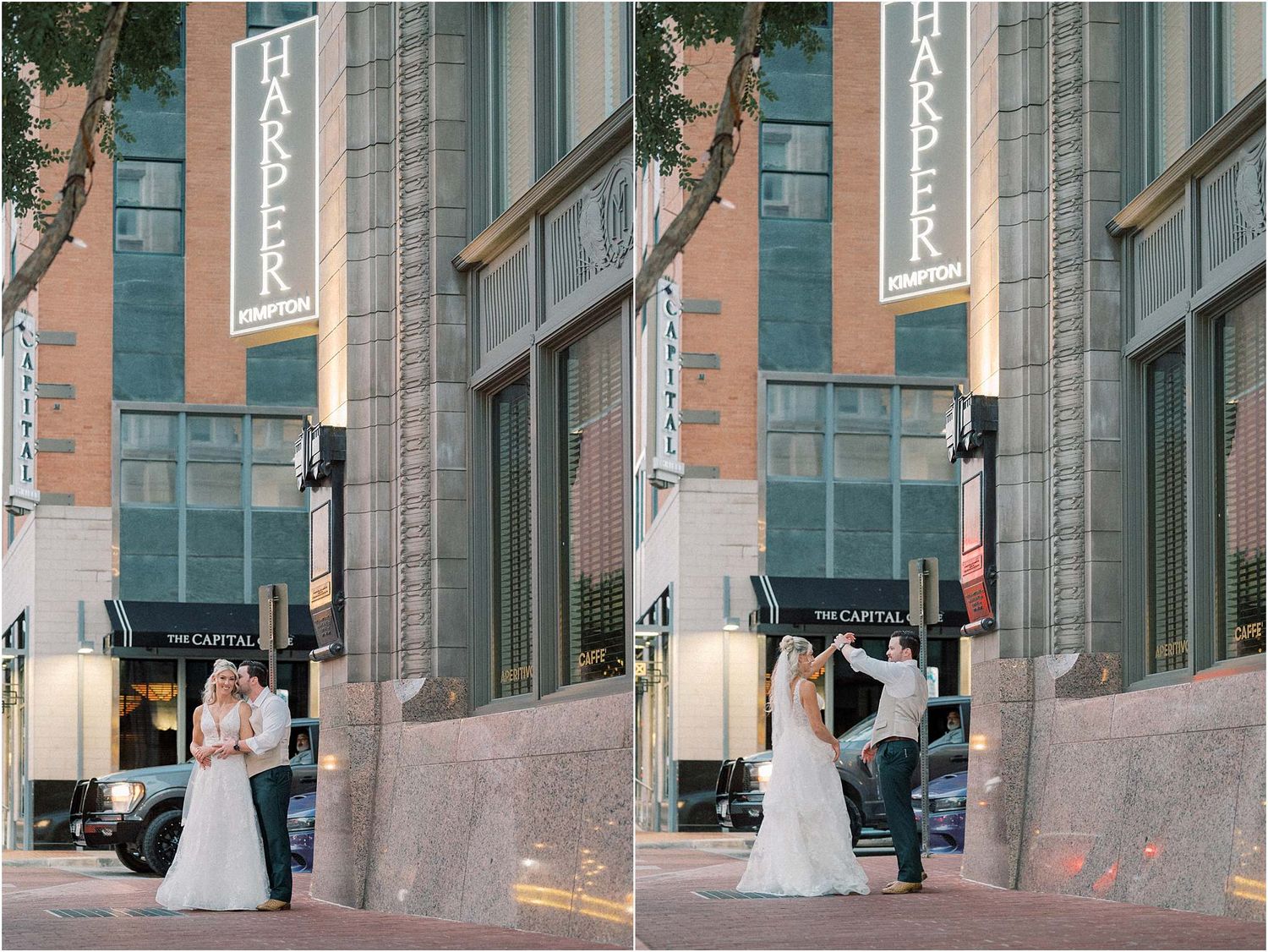 Wedding party poses outside a modern glass building entrance.