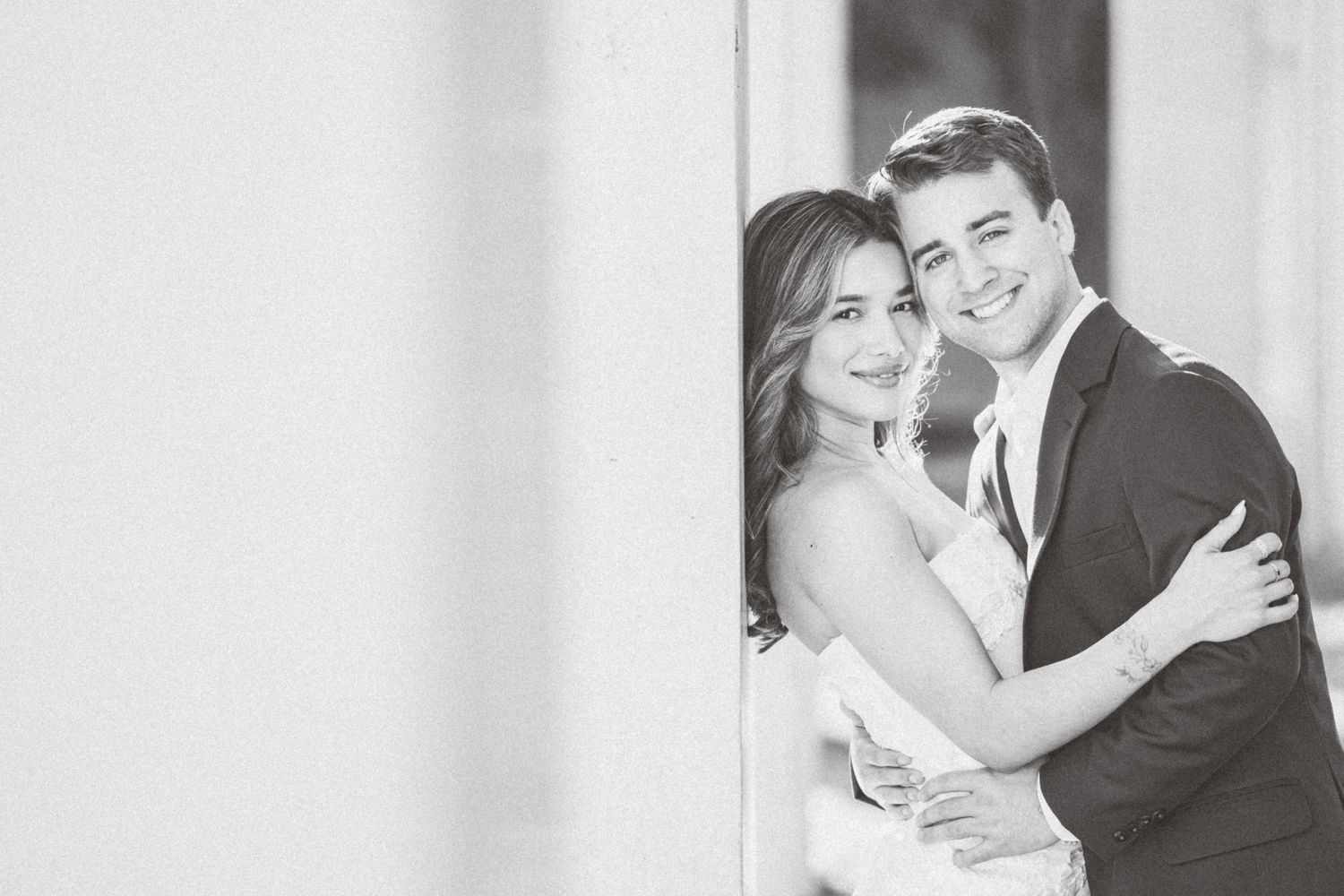 A romantic wedding photo collage showing four intimate moments between a couple in formal attire against a light background.
