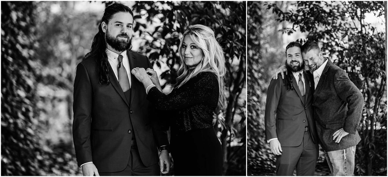 Black and white engagement photos of a couple posing together outdoors among lush trees in elegant attire.