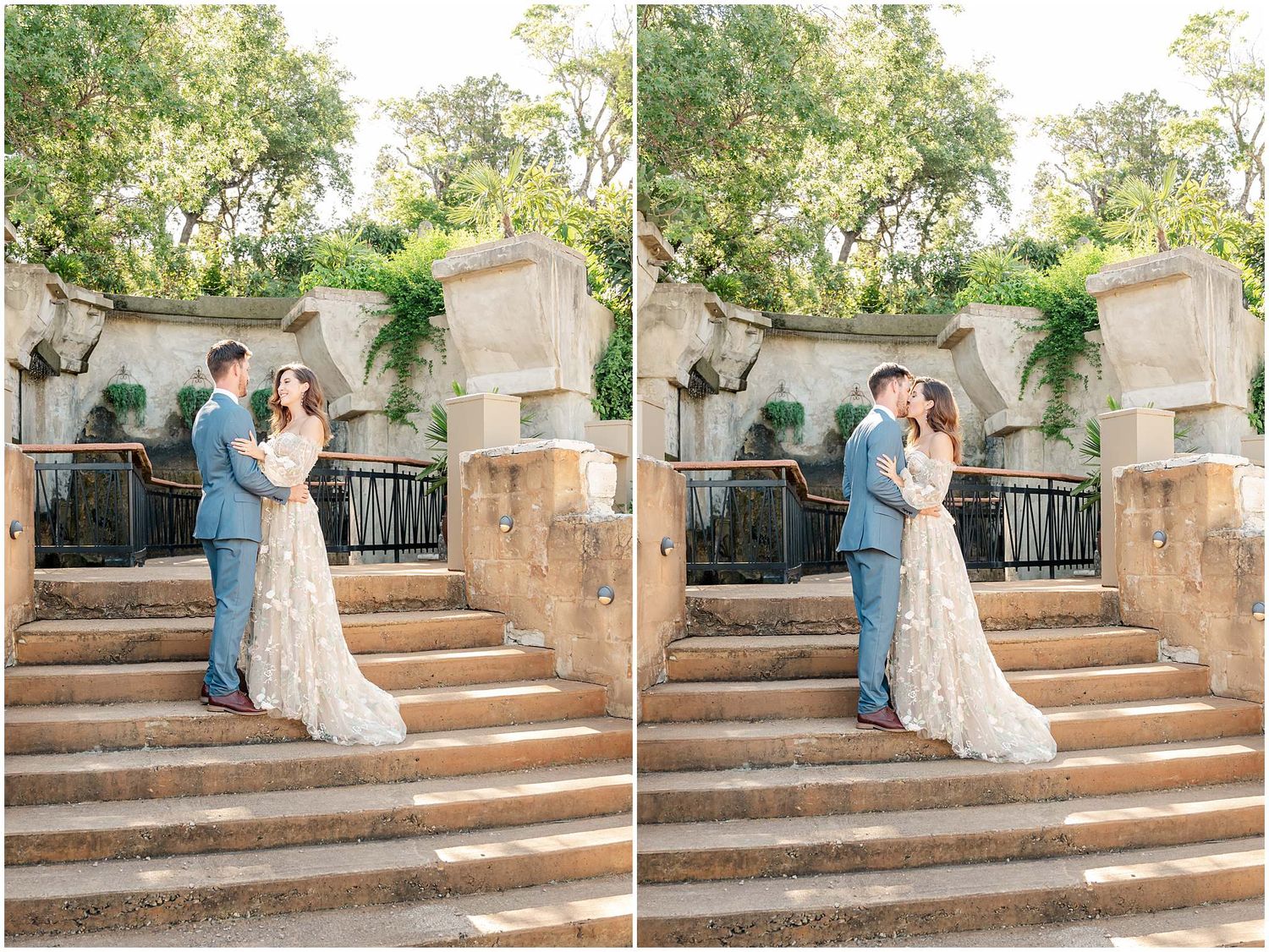 A couple shares a romantic moment on stone steps surrounded by lush greenery and architecture.
