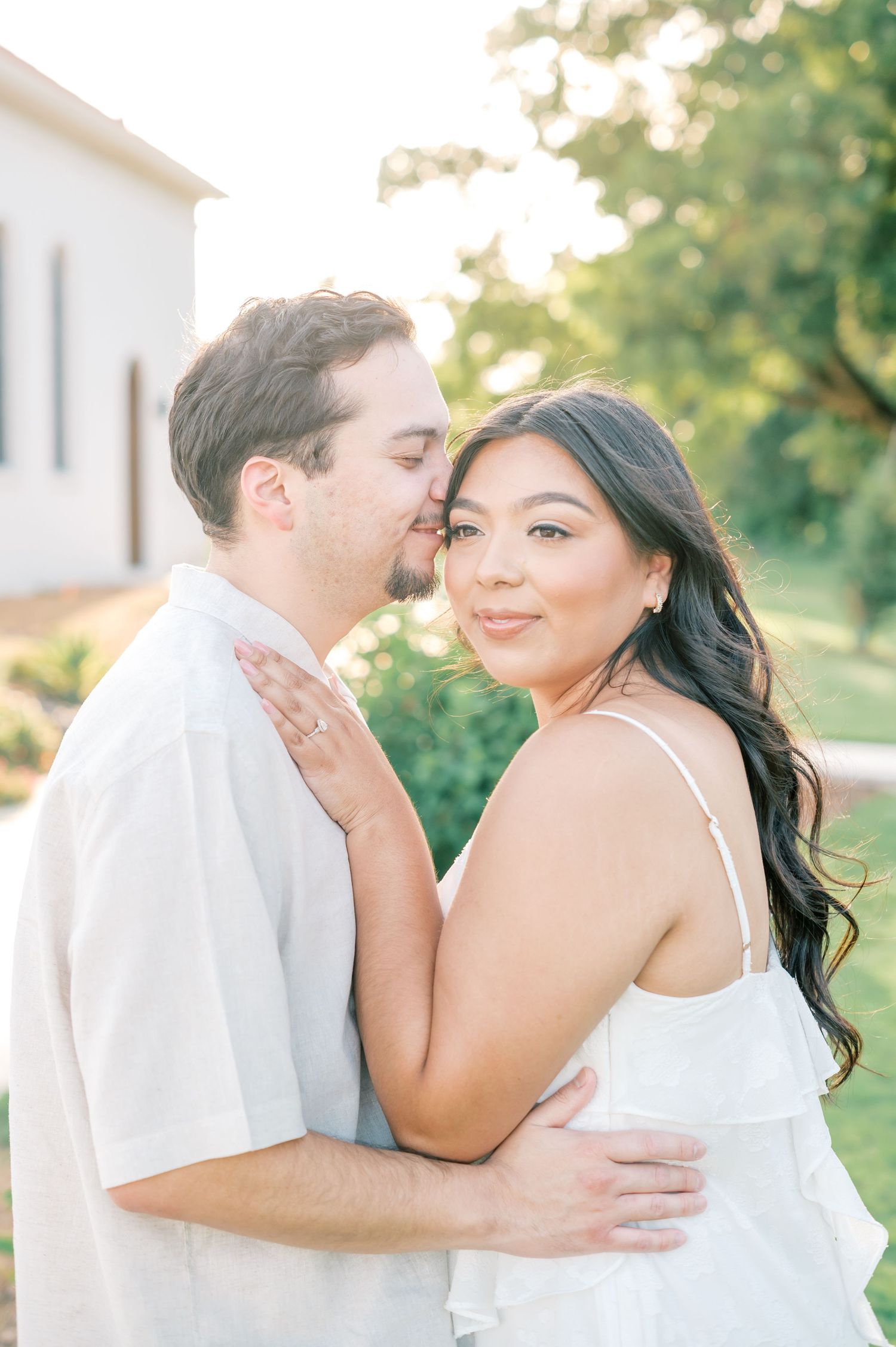 A romantic sequence of wedding photos showing a couple embracing outdoors with soft natural lighting and white attire.
