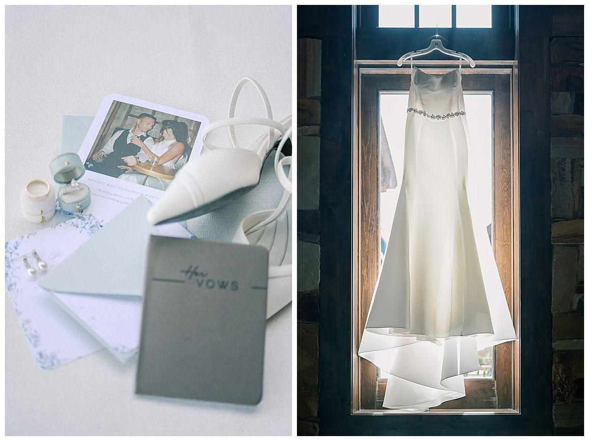 Wedding details including vows book and white bridal gown hanging in window light.
