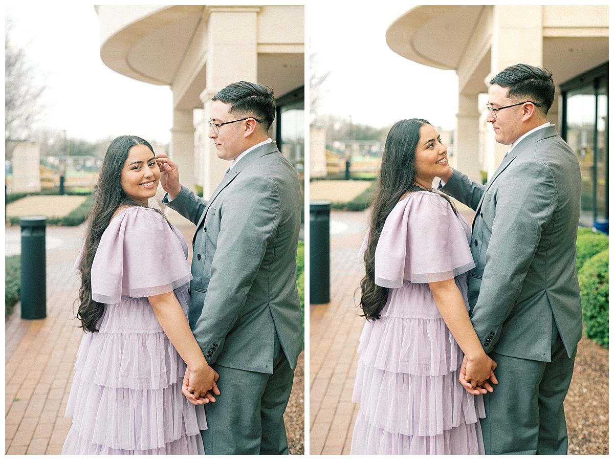 A couple in lavender dress and grey suit share tender moments outdoors.