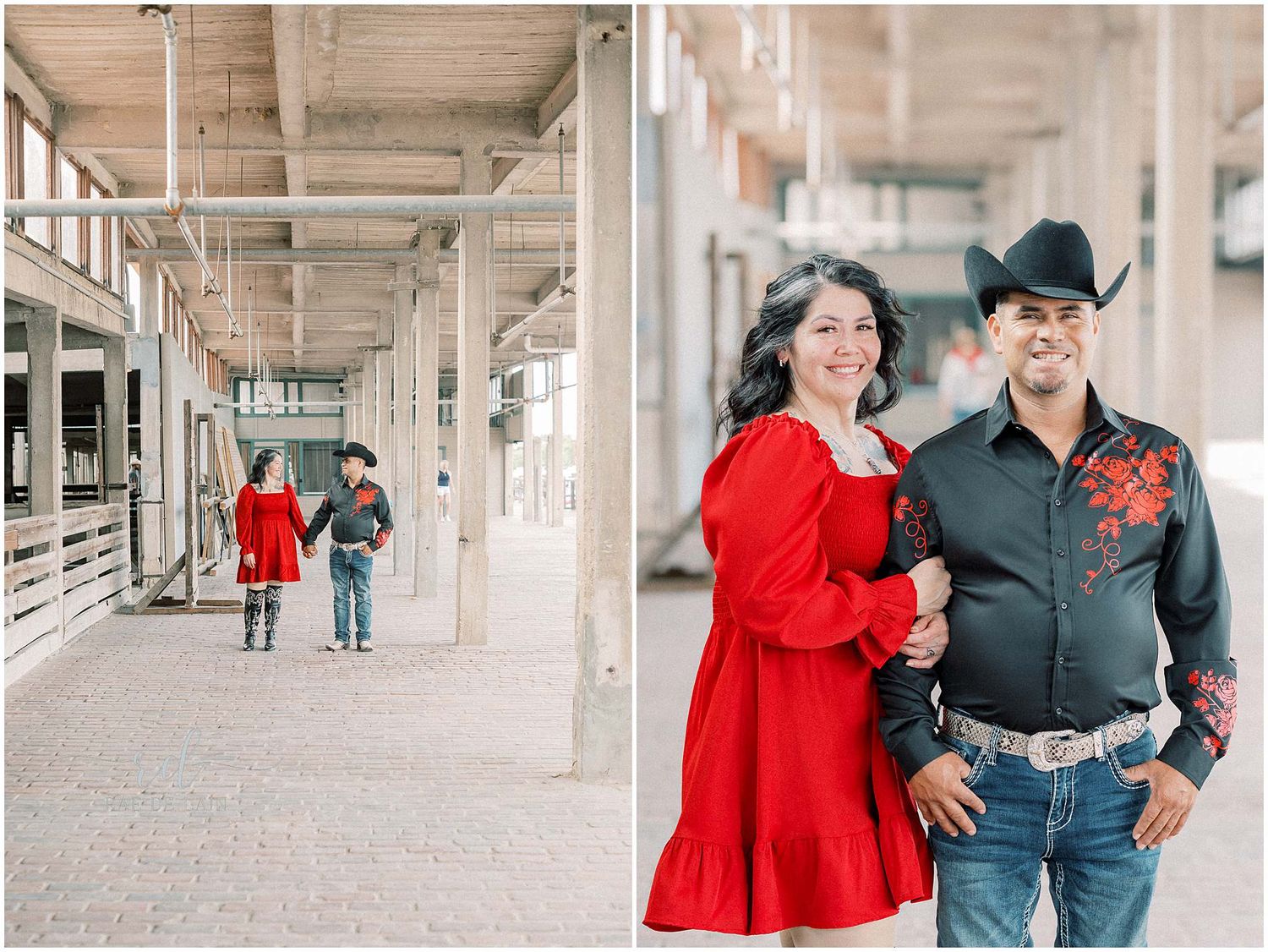 A couple poses together in a bright industrial hallway, with the woman wearing a vibrant red dress and man in western attire.