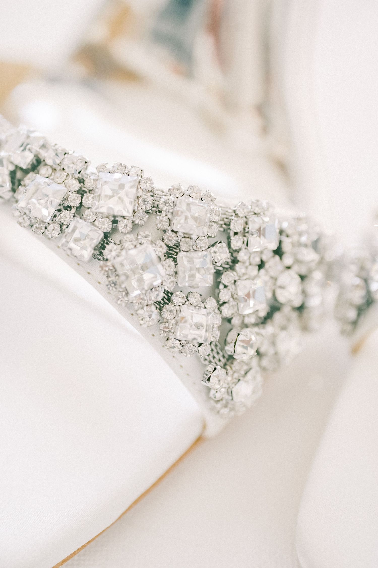Crystal-embellished bridal shoes with intricate beading details.
