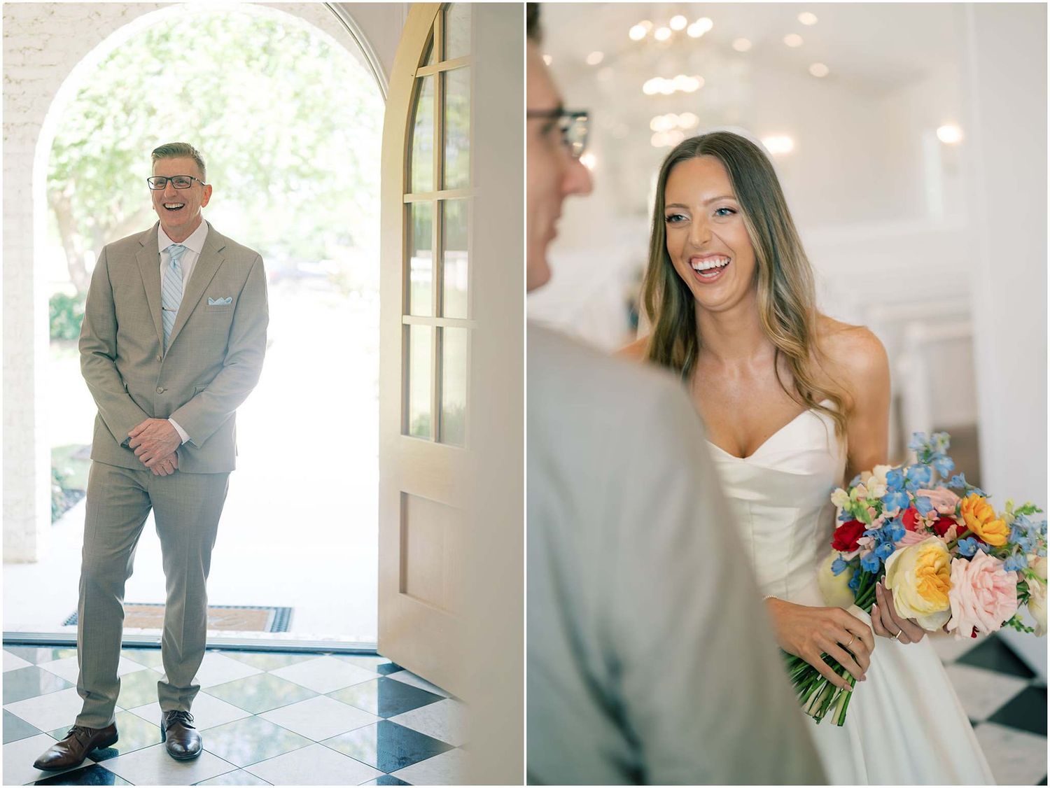 Bride in strapless gown holds vibrant bouquet as groom in tan suit awaits her at elegant venue doors.