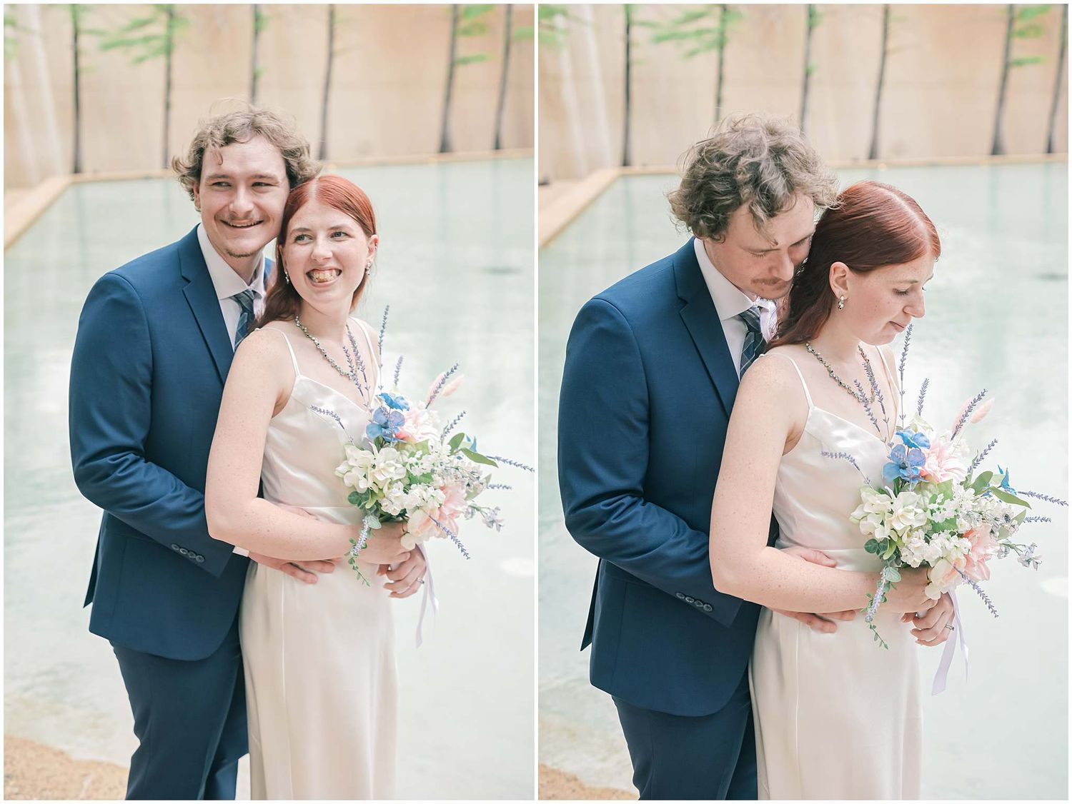 Romantic wedding couple poses together in soft lighting while holding a delicate bouquet of blue and white flowers.