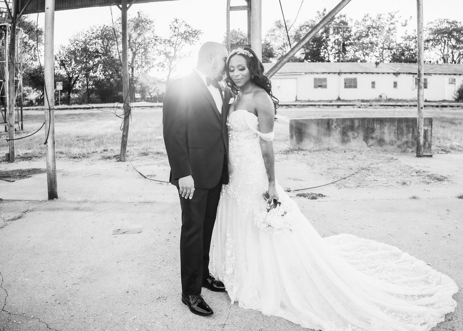 Black and white wedding portraits captured in outdoor setting with natural light.
