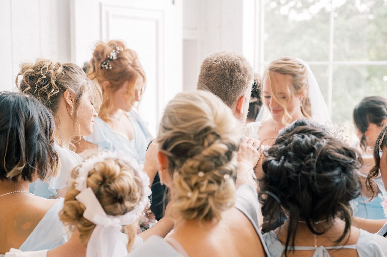 Collection of elegant updo hairstyles with braids and curls for special occasion.