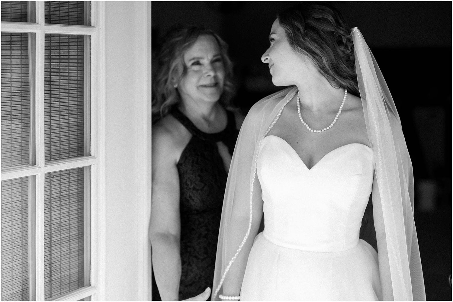 Black and white wedding photos showing elegant bridal portraits in a classic style.