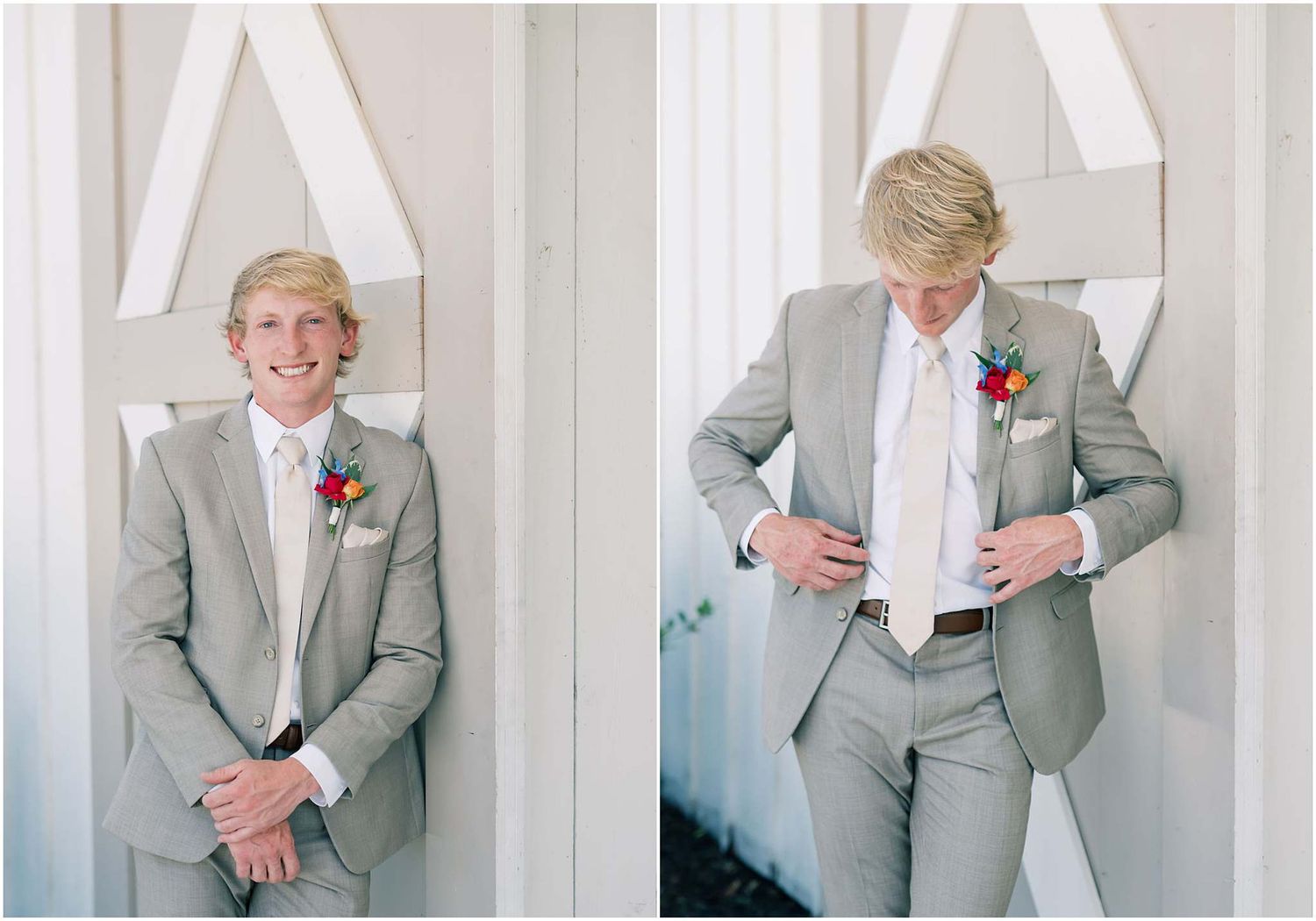 Blond groom in a light gray suit with colorful boutonniere posing against a white geometric backdrop.
