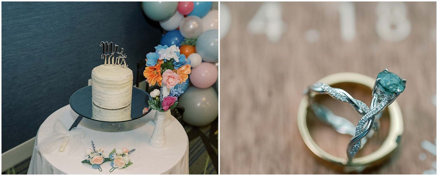 Wedding cake details with blue accents and floral decorations on white tablecloth.