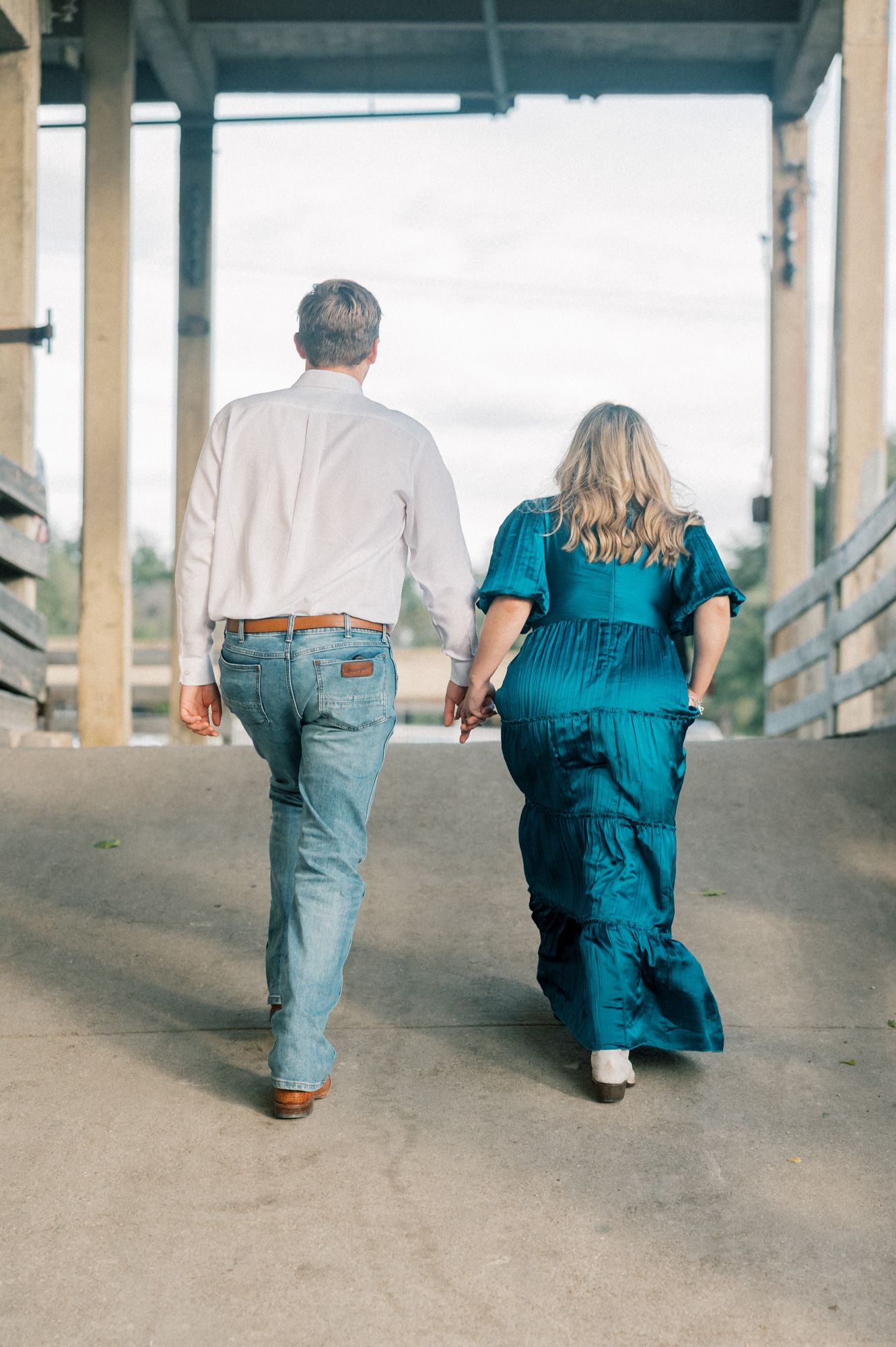 A sequence of photos showing a couple walking together down a covered walkway.