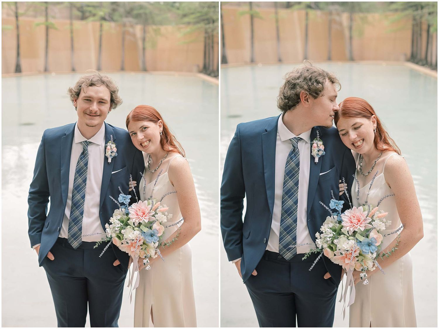 A couple poses for wedding photos in formal attire with a pink and blue floral bouquet against a neutral wall.