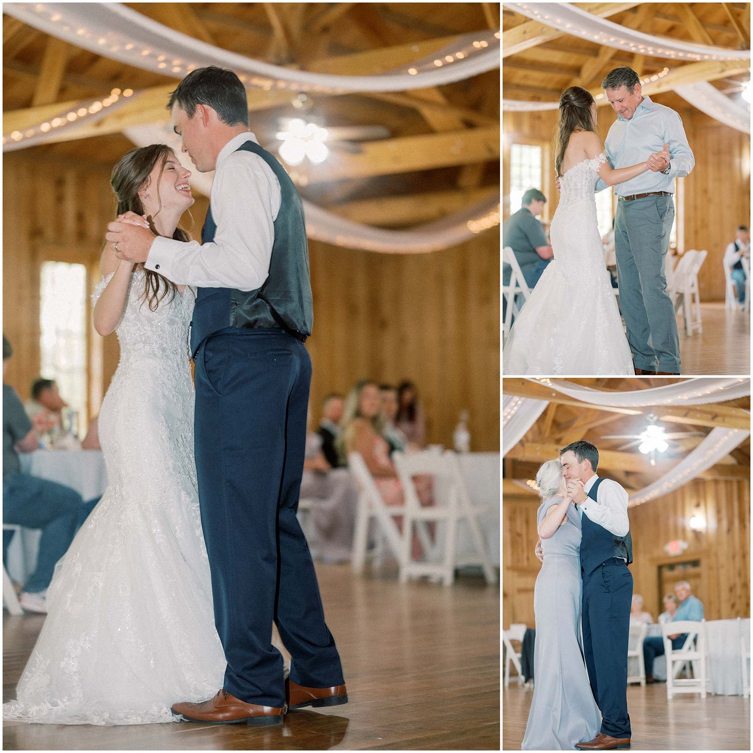 A couple shares a romantic dance moment in a rustic barn venue decorated with white fabric draping from wooden beams.
