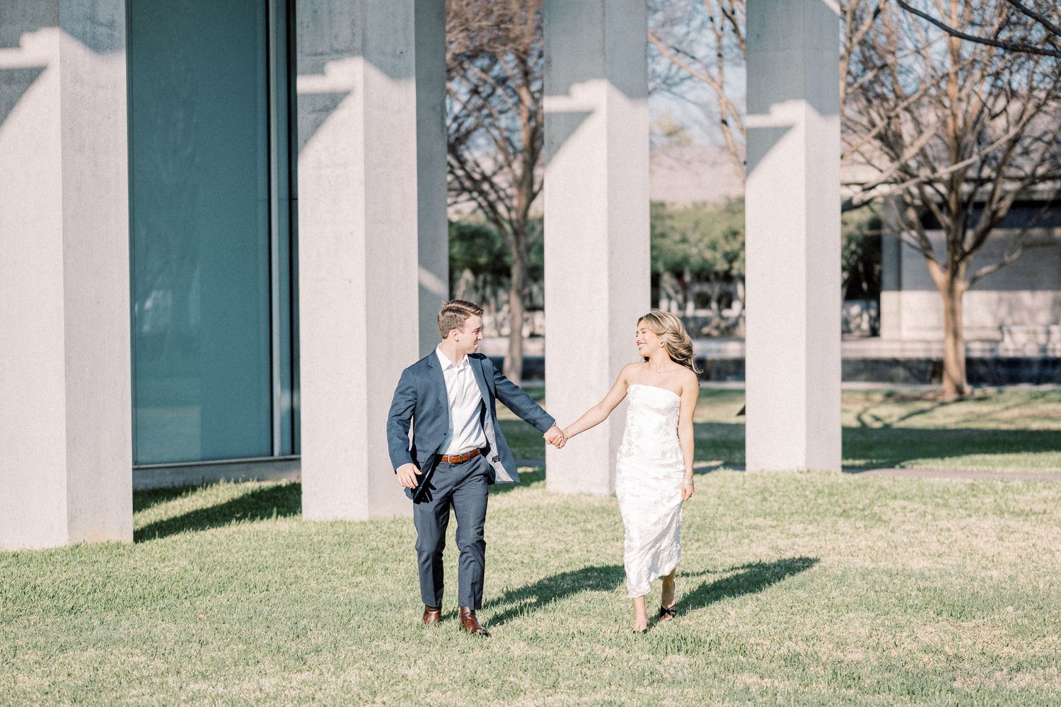 A series of connected outdoor photos showing a romantic couple walking and embracing in a park setting.