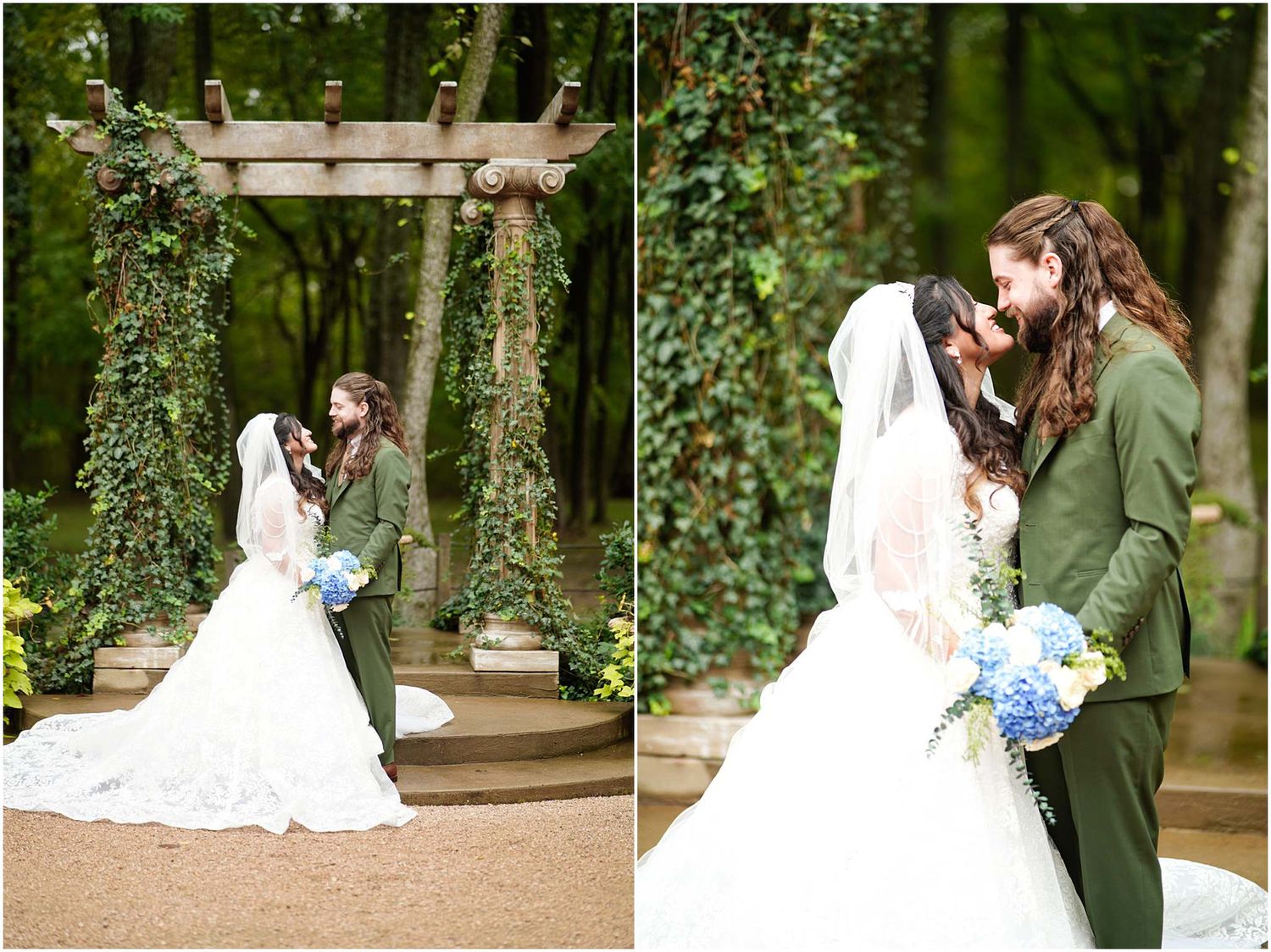 Bride in white gown and groom in green suit share a romantic kiss under an ivy-covered wooden arch outdoors.
