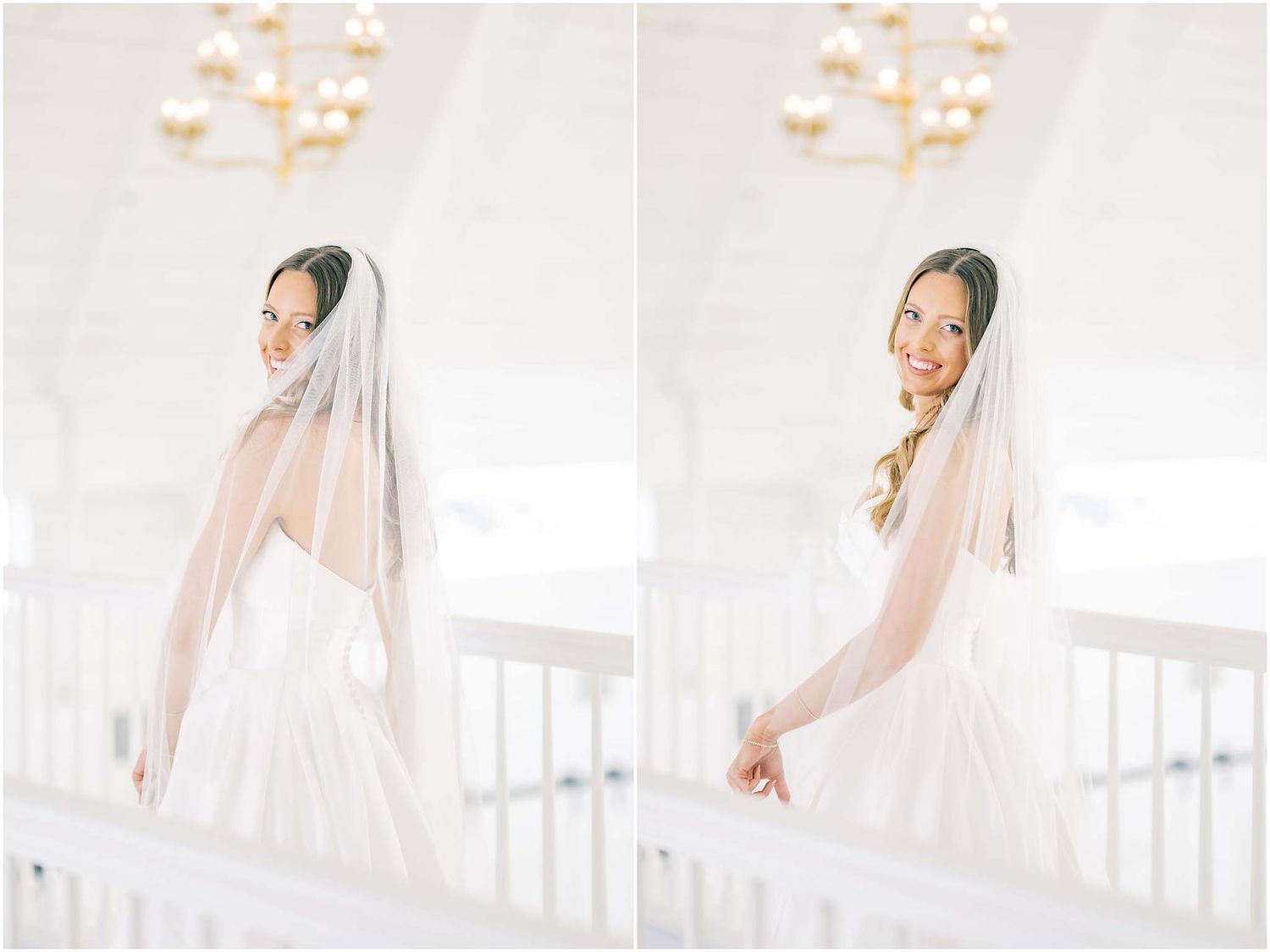 Elegant bride in a white wedding dress and veil posing on a staircase in a bright, airy venue.