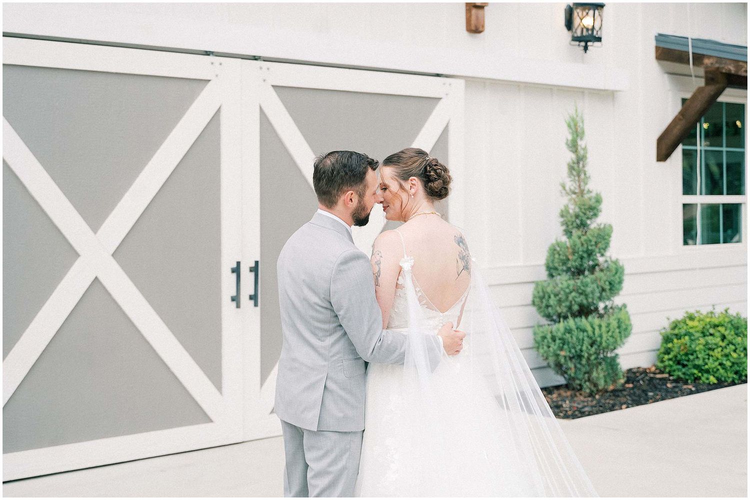 A romantic wedding photo collage showing tender moments between a couple in elegant attire against a white building exterior.