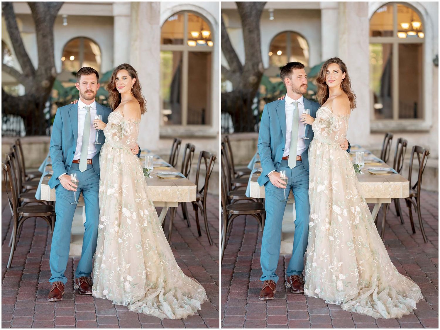 Wedding couple in formal attire posing together outdoors with bride in lace gown and groom in light blue suit.