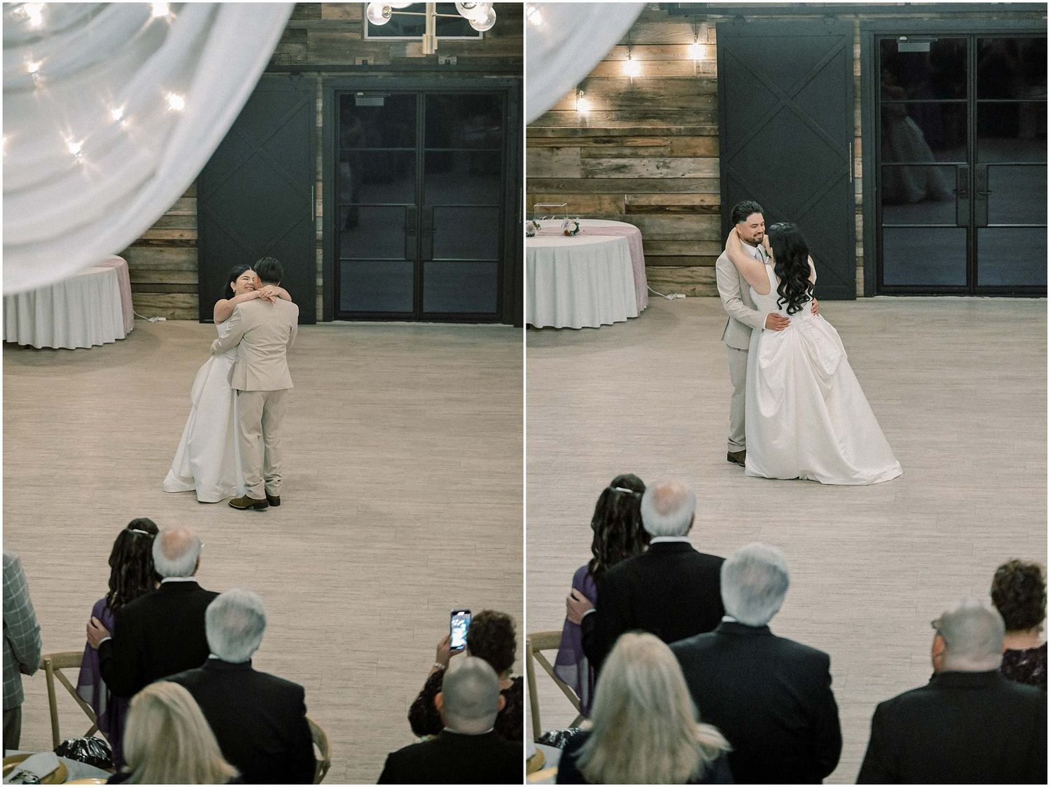 Wedding guests watching the newlyweds' first dance in an elegant indoor venue.