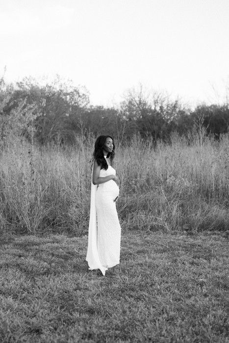 A series of black and white photos showing a person in a white dress walking through a grassy field.