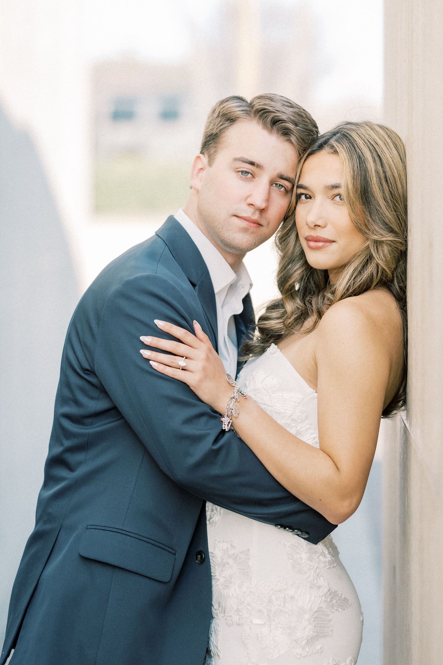 A romantic wedding photo collage showing tender moments between newlyweds in formal attire against a light backdrop.