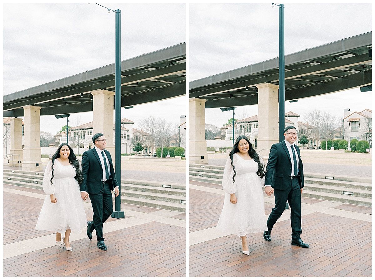 A couple walking along a covered outdoor walkway with columns.